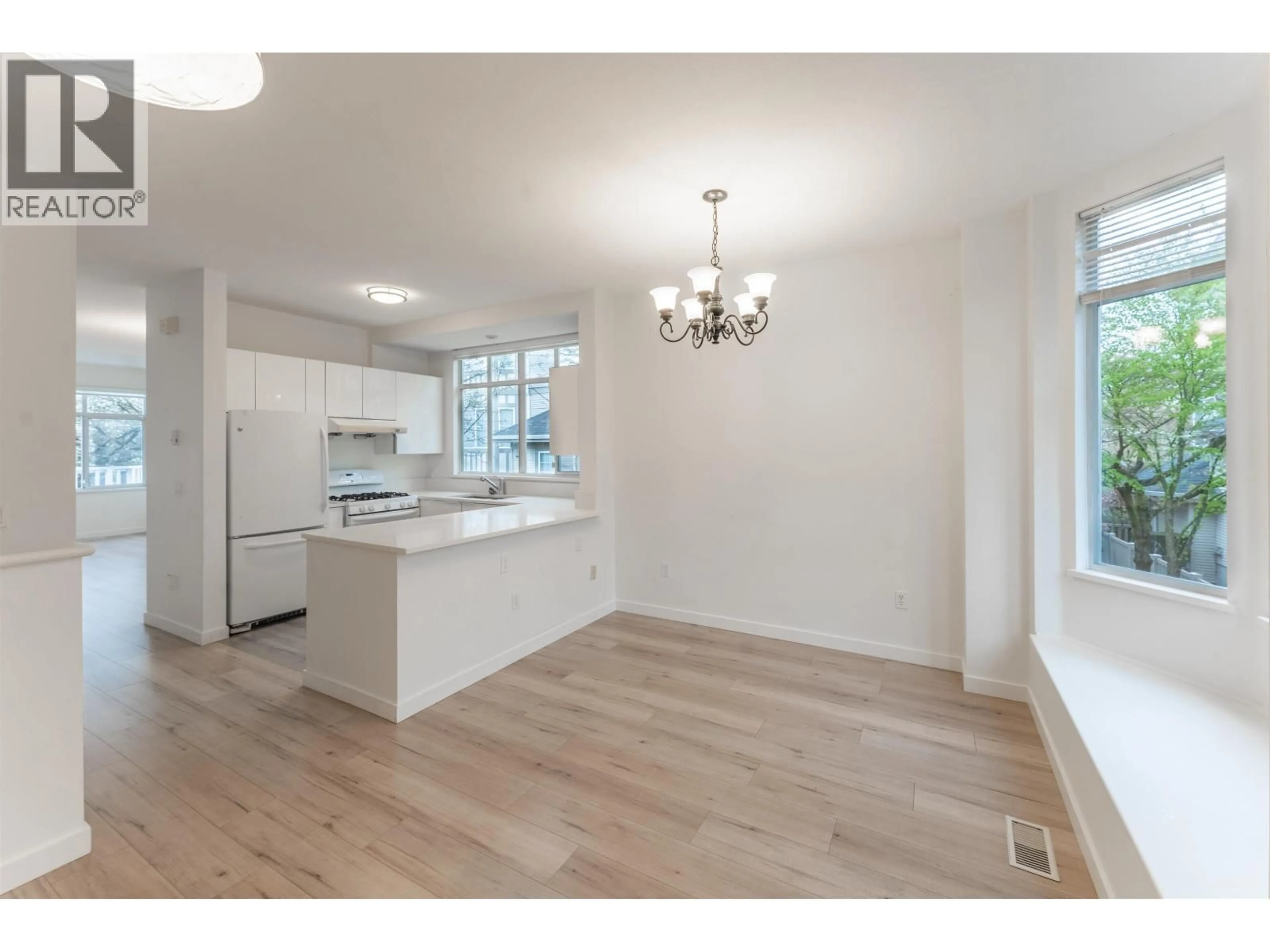 Open concept kitchen, wood/laminate floor for 8 - 6111 NO. 1 ROAD, Richmond British Columbia V7C1T4