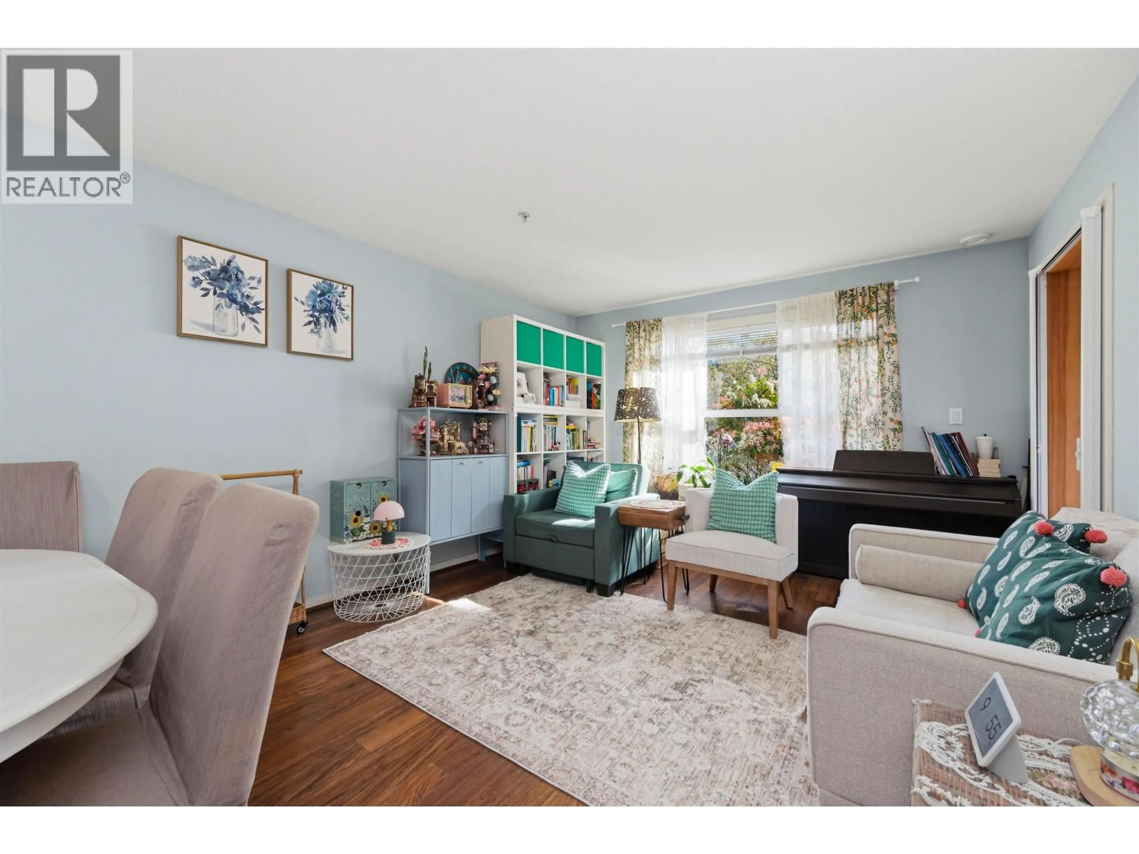 Living room with furniture, wood/laminate floor for 109 - 5889 IRMIN STREET, Burnaby British Columbia V5J0C1