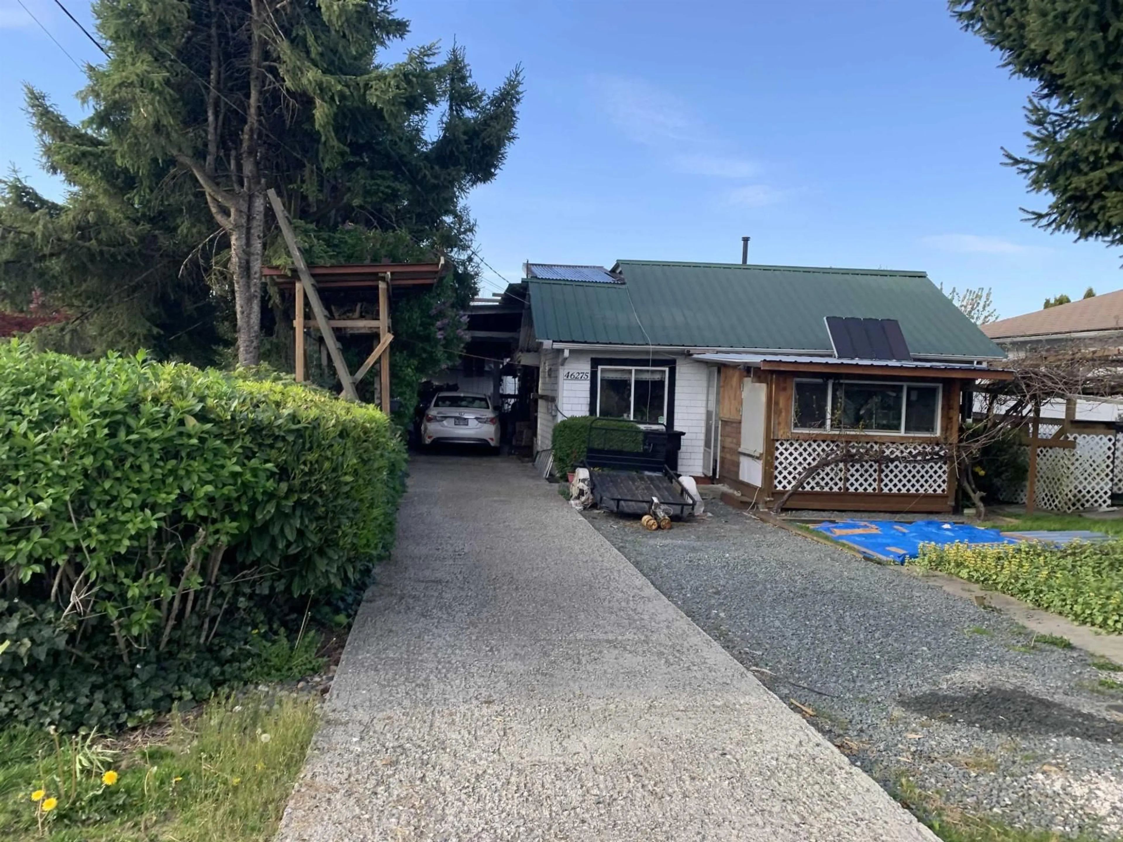 A pic from outside/outdoor area/front of a property/back of a property/a pic from drone, street for 46275 PORTAGE AVENUE, Chilliwack British Columbia V2P3E7