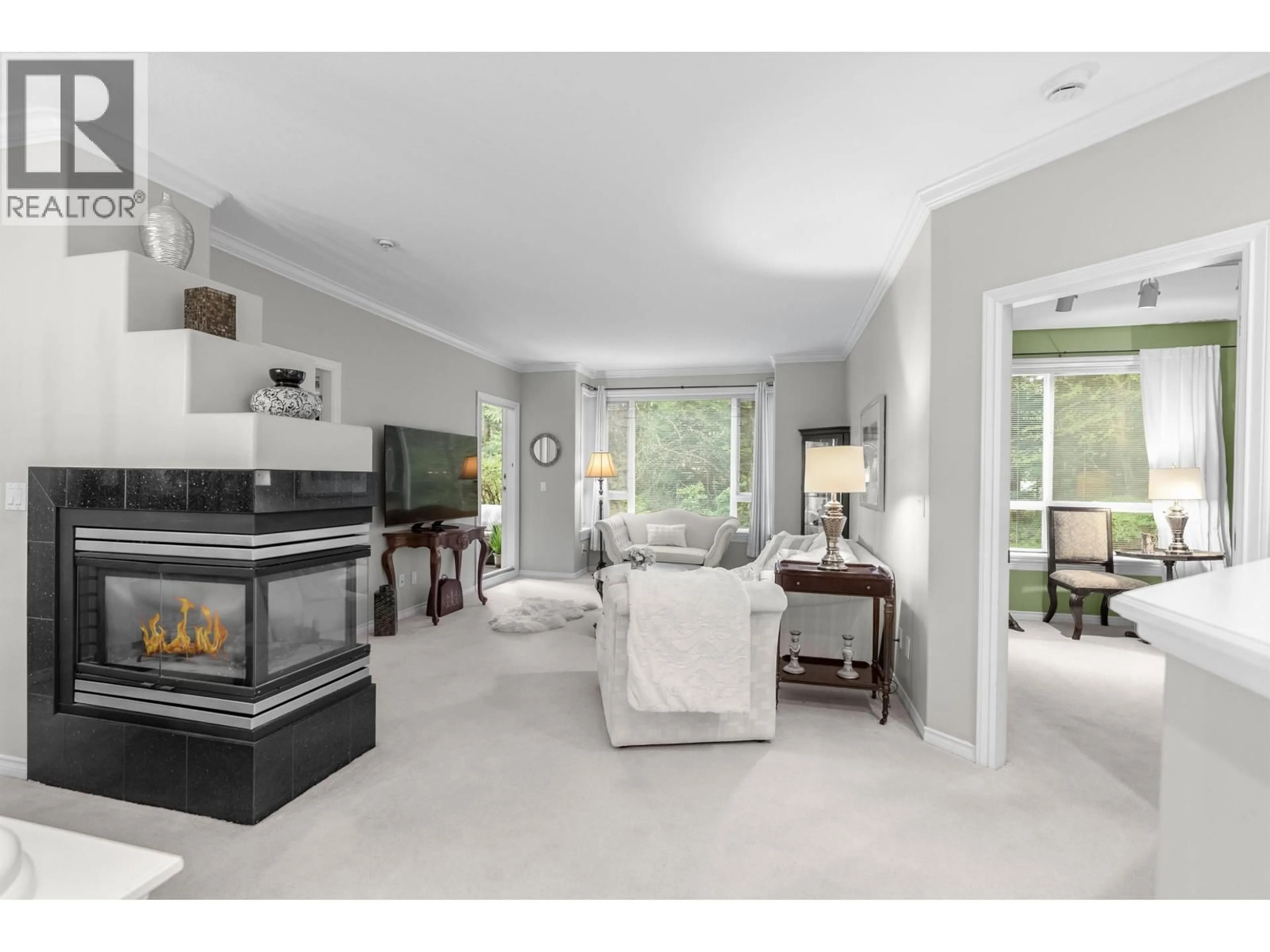 Living room with furniture, unknown for 109 - 3280 PLATEAU BOULEVARD, Coquitlam British Columbia V3E3J5