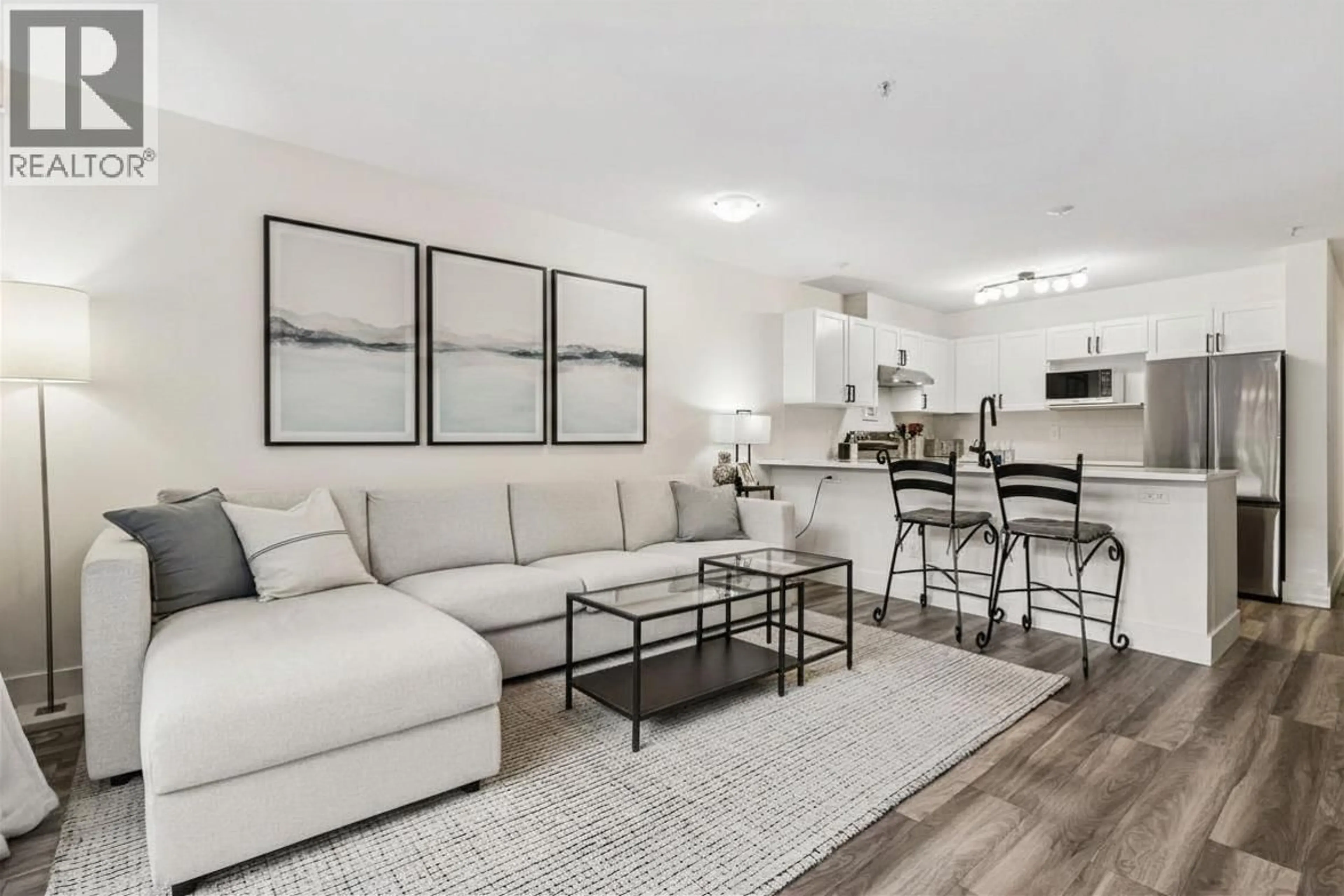 Living room with furniture, unknown for 102 - 365 1ST STREET, North Vancouver British Columbia V7L4W5