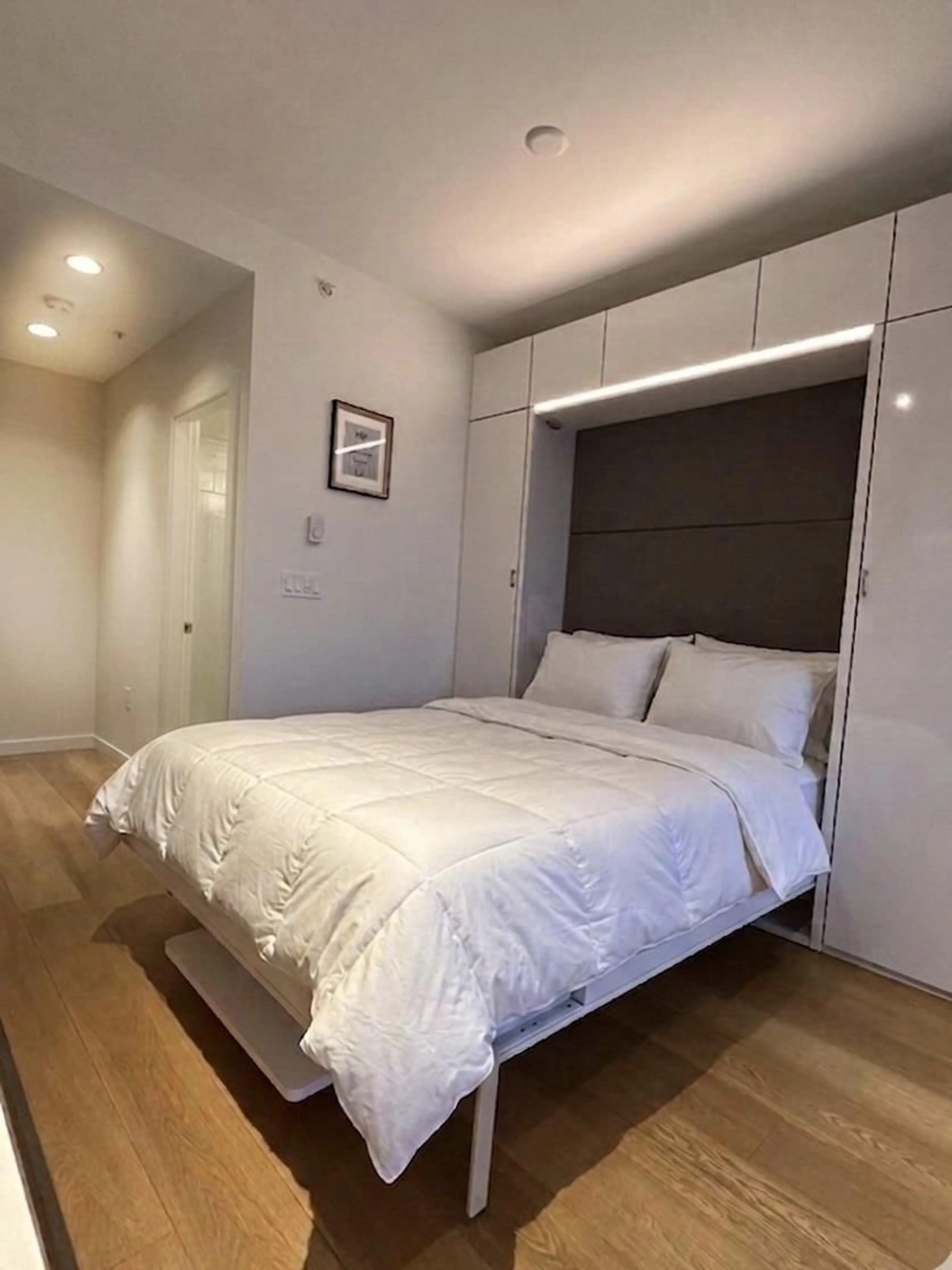 Bedroom with bed, wood/laminate floor for 3101 - 13438 CENTRAL AVENUE, Surrey British Columbia V3T0N2