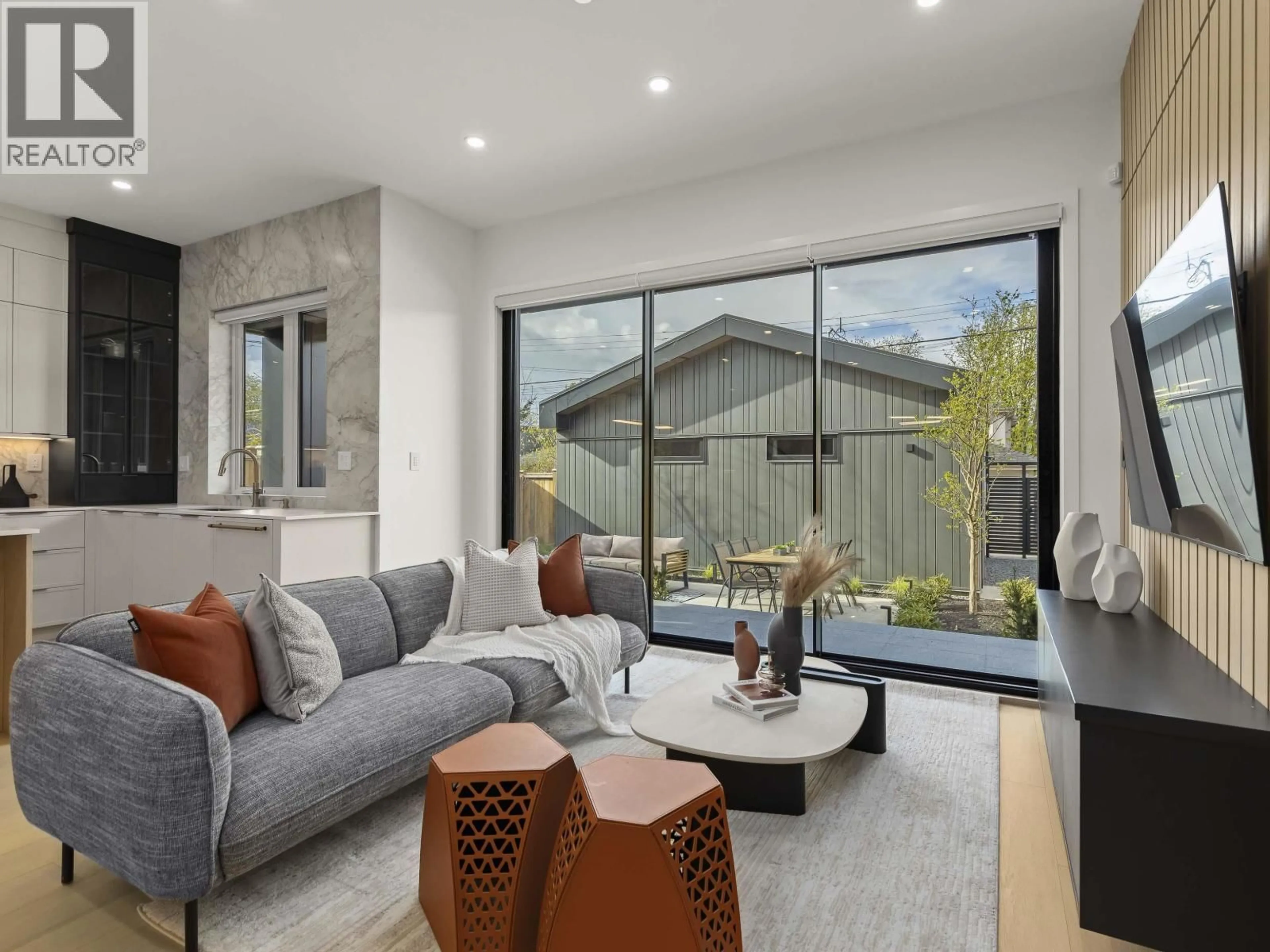 Living room with furniture, cement floor for 2 - 3255 13TH AVENUE, Vancouver British Columbia V6K2V6