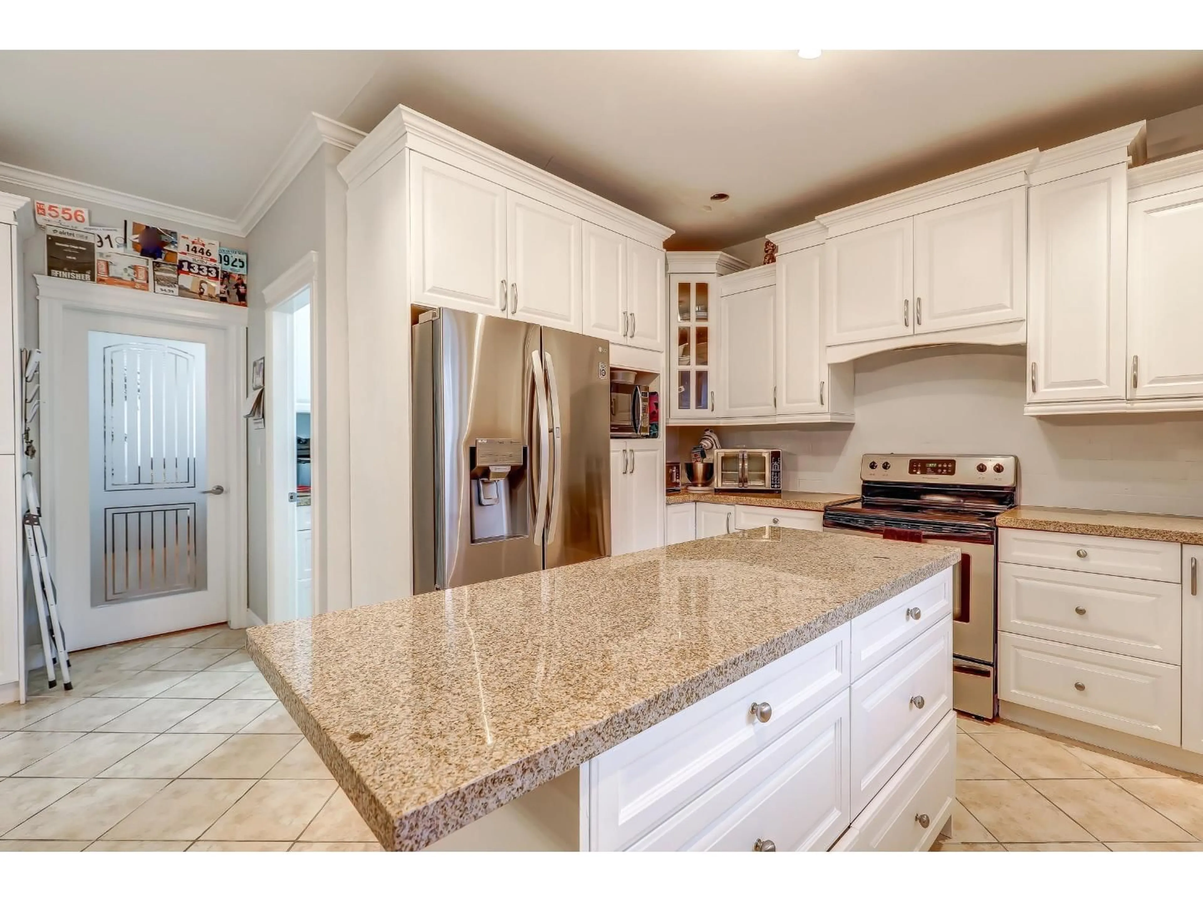 Open concept kitchen, ceramic/tile floor for 16226 96B AVENUE, Surrey British Columbia V3S2M4