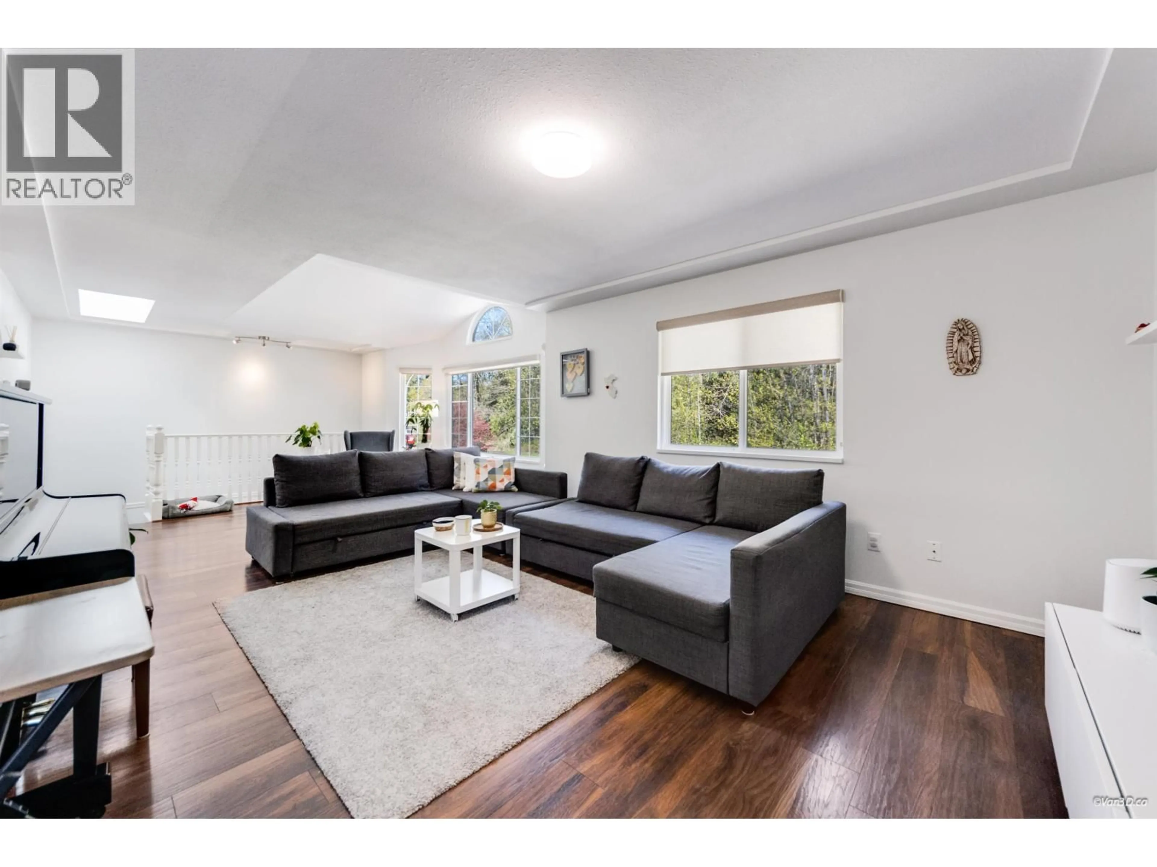 Living room with furniture, wood/laminate floor for 1236 CHELSEA AVENUE, Port Coquitlam British Columbia V3B7J9