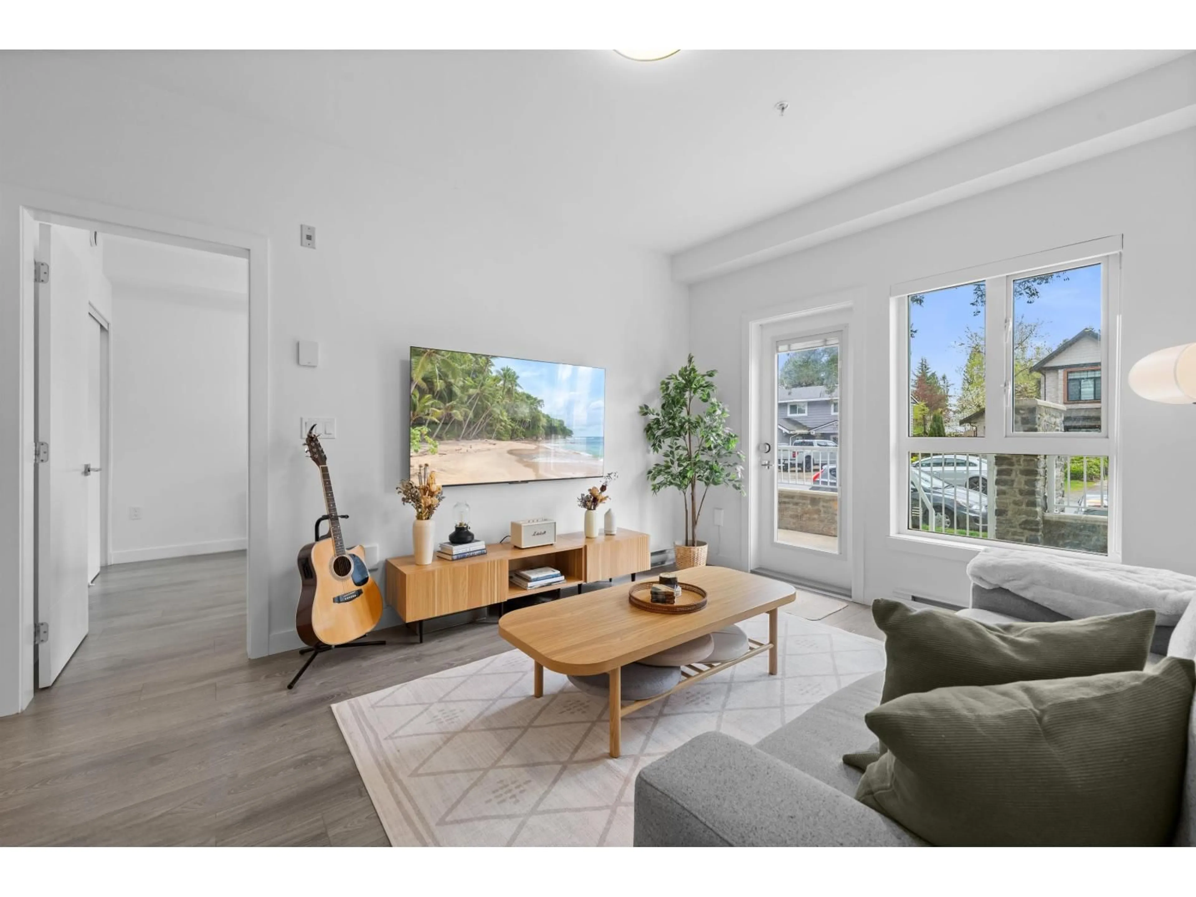 Living room with furniture, unknown for 105 - 14225 103A AVENUE, Surrey British Columbia V3T0T4