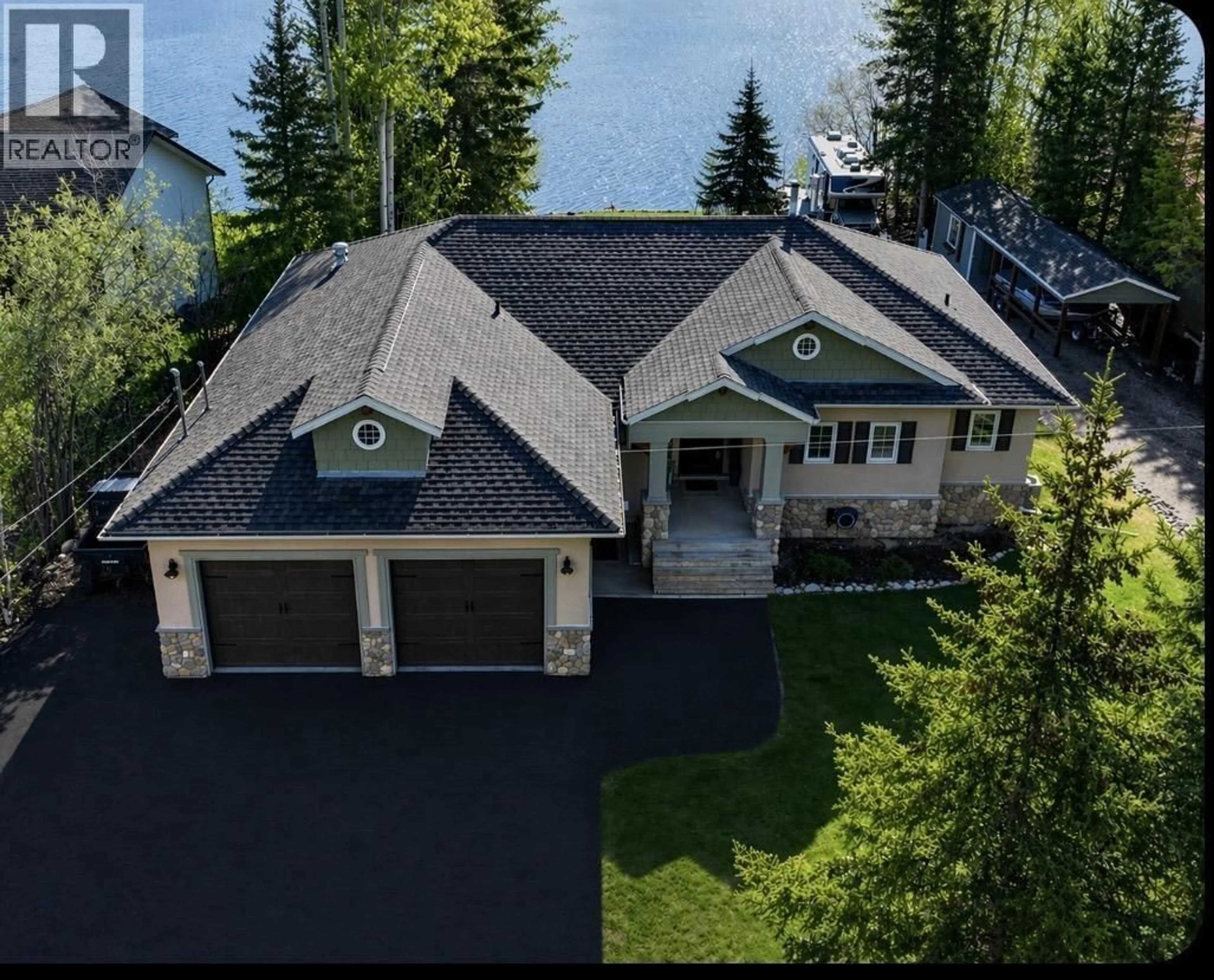 A pic from outside/outdoor area/front of a property/back of a property/a pic from drone, water/lake/river/ocean view for 13777 GOLF COURSE ROAD, Charlie Lake British Columbia V1J8K8