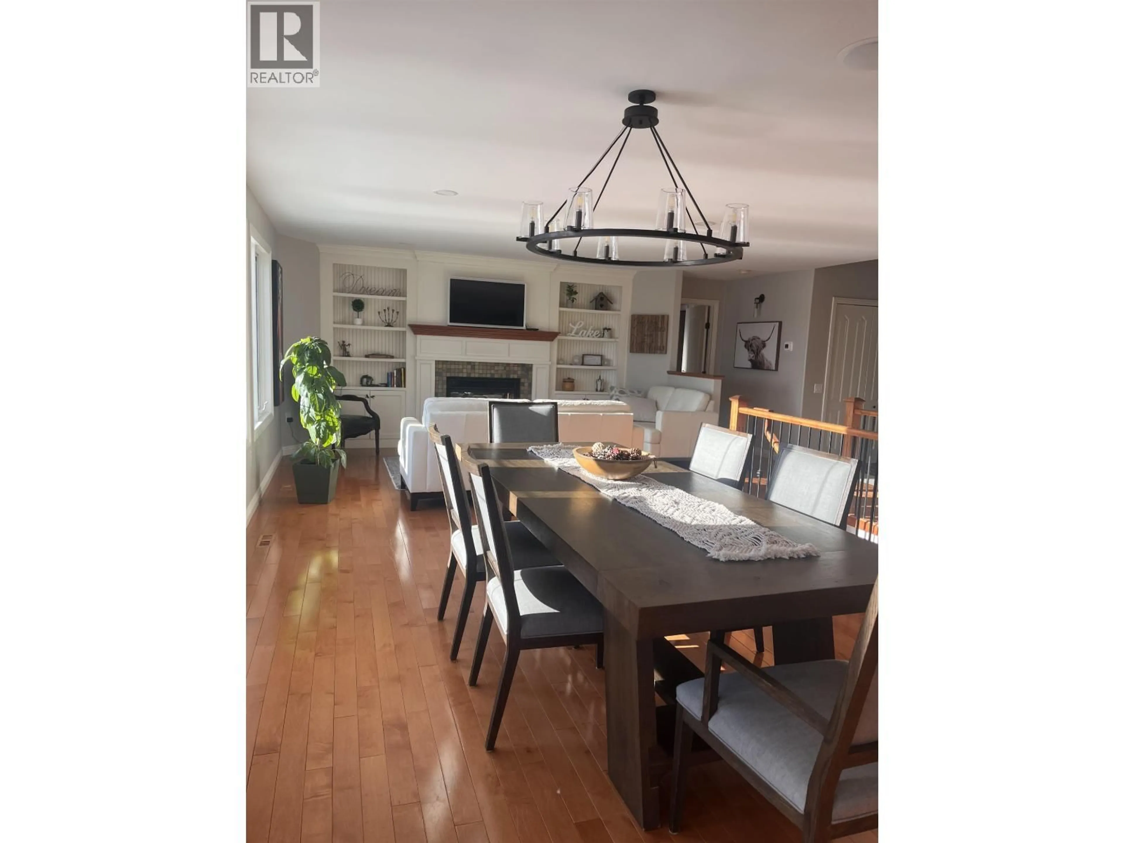 Dining room, wood/laminate floor for 13777 GOLF COURSE ROAD, Charlie Lake British Columbia V1J8K8