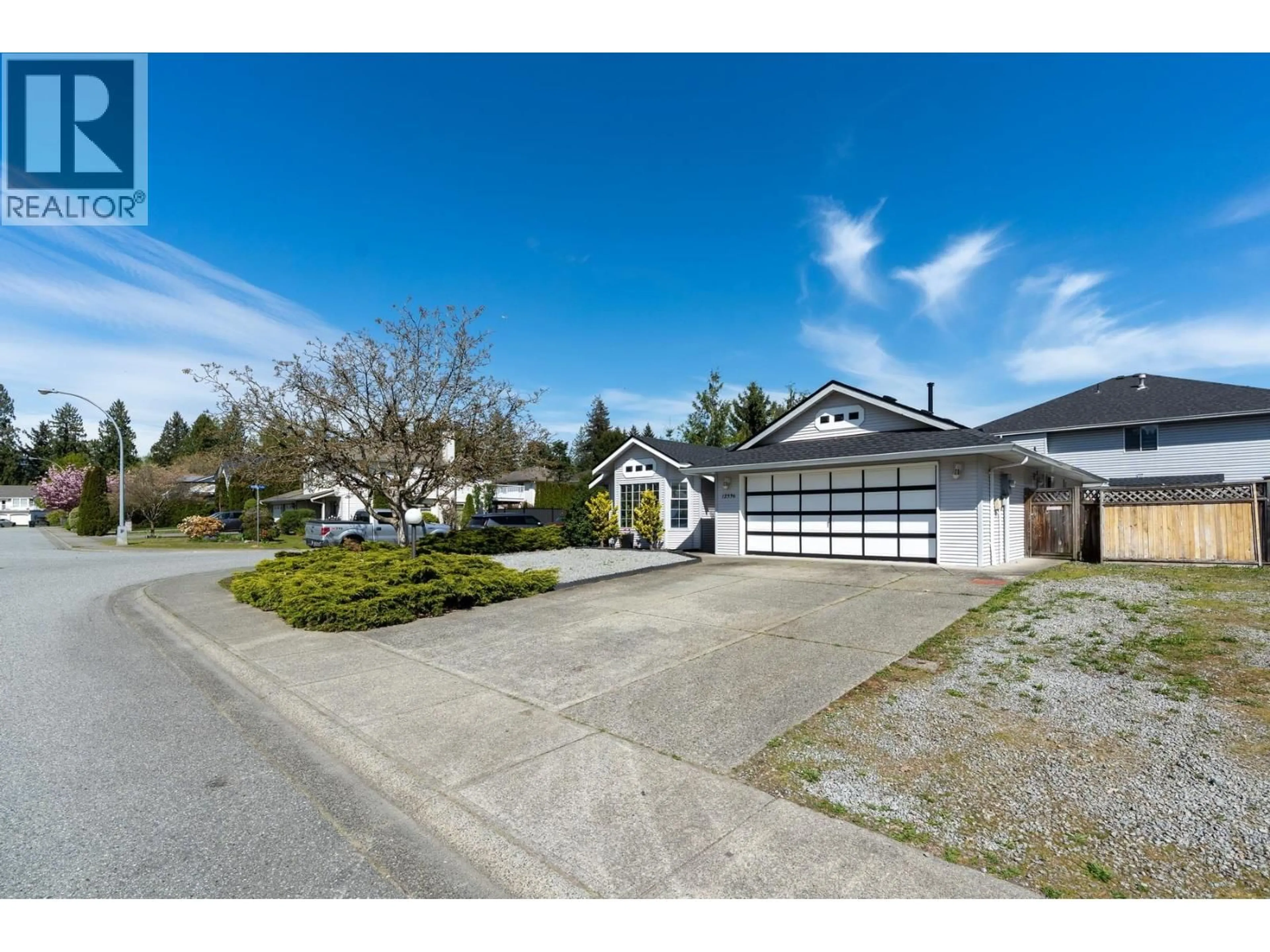 A pic from outside/outdoor area/front of a property/back of a property/a pic from drone, street for 12336 NIKOLA STREET, Pitt Meadows British Columbia V3Y2K9