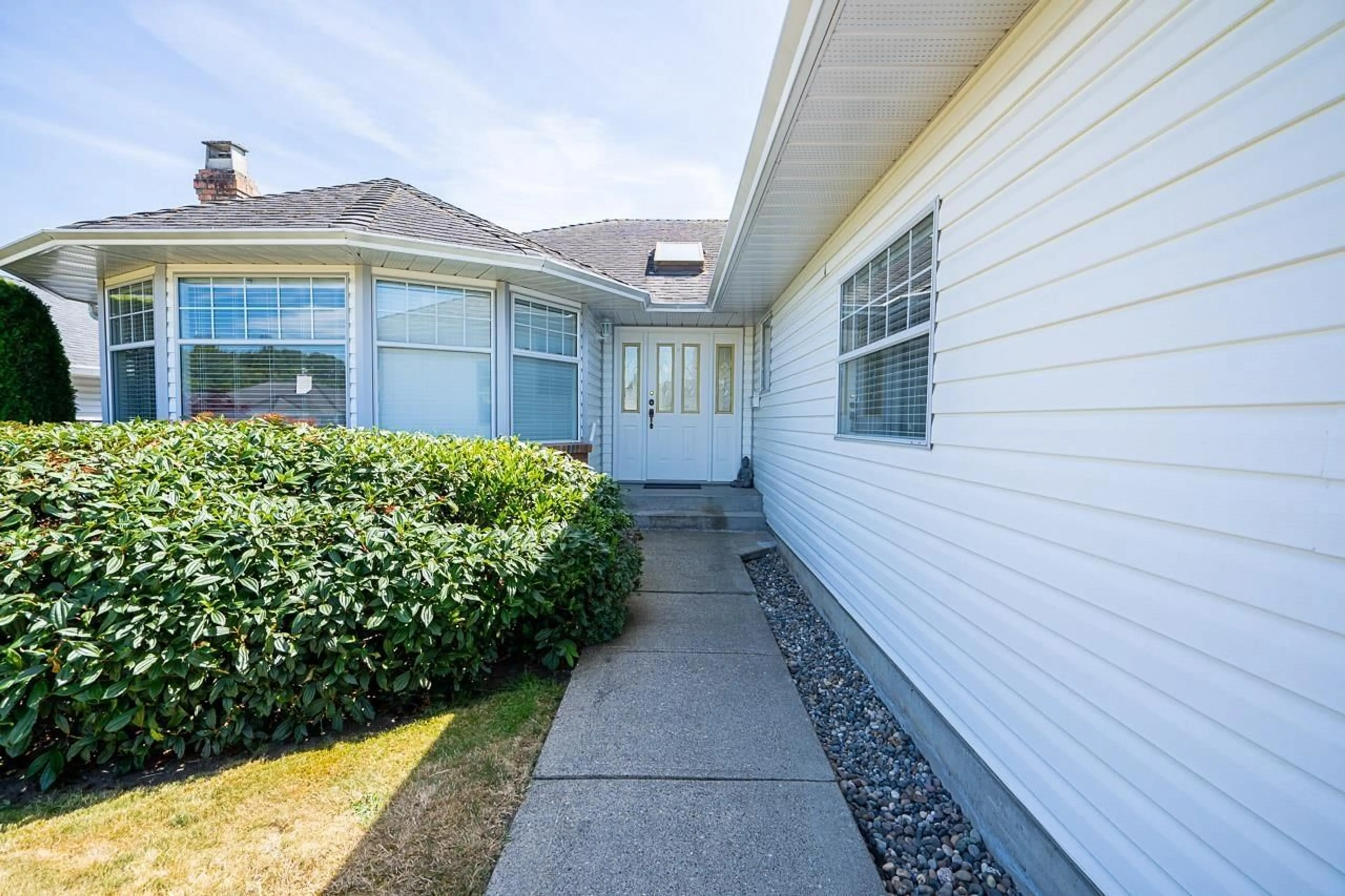 Home with vinyl exterior material, street for 16158 16A AVENUE, Surrey British Columbia V4A9J9