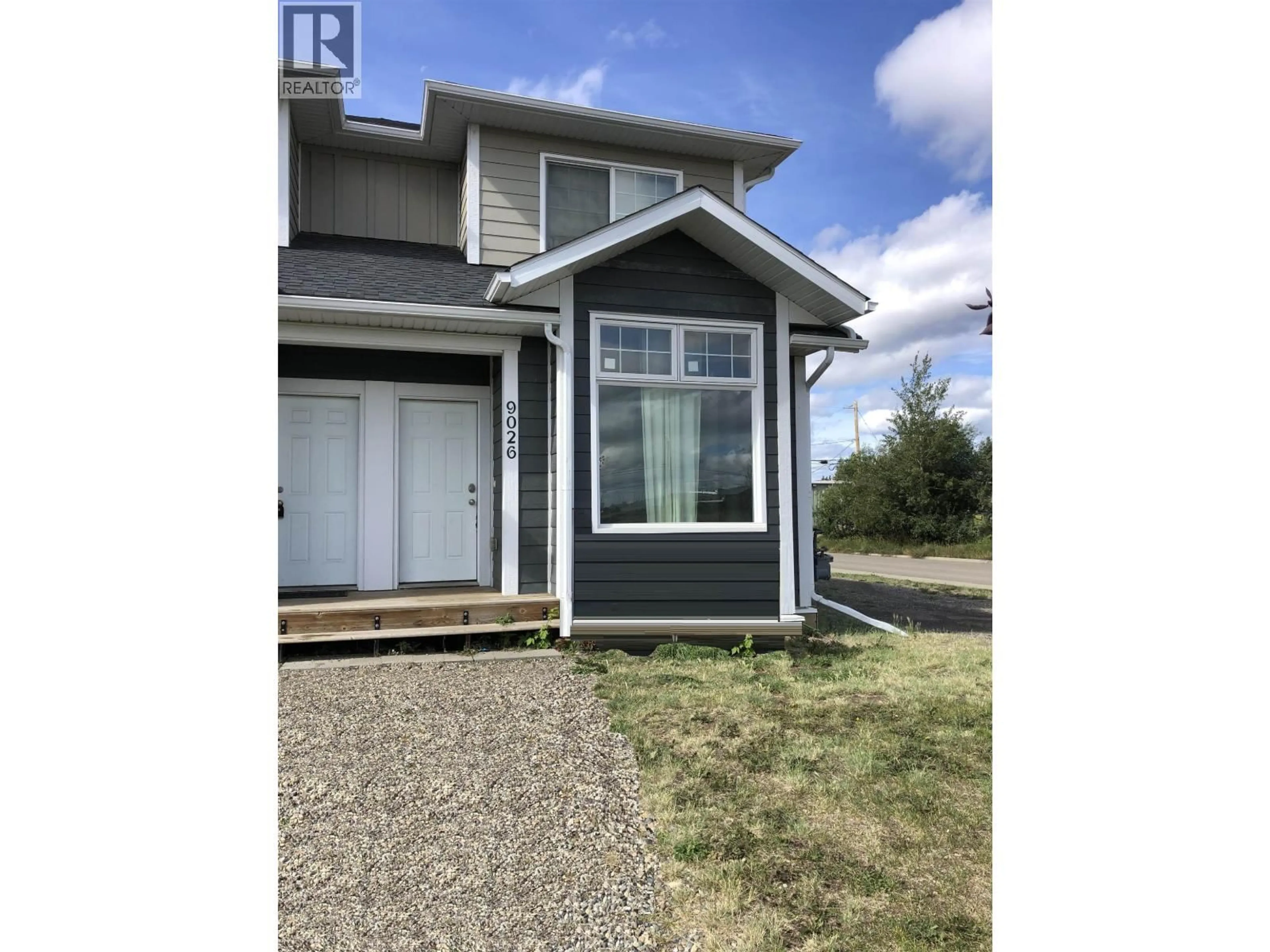 Home with vinyl exterior material, water/lake/river/ocean view for 9026 74 STREET, Fort St. John British Columbia V1J0N7