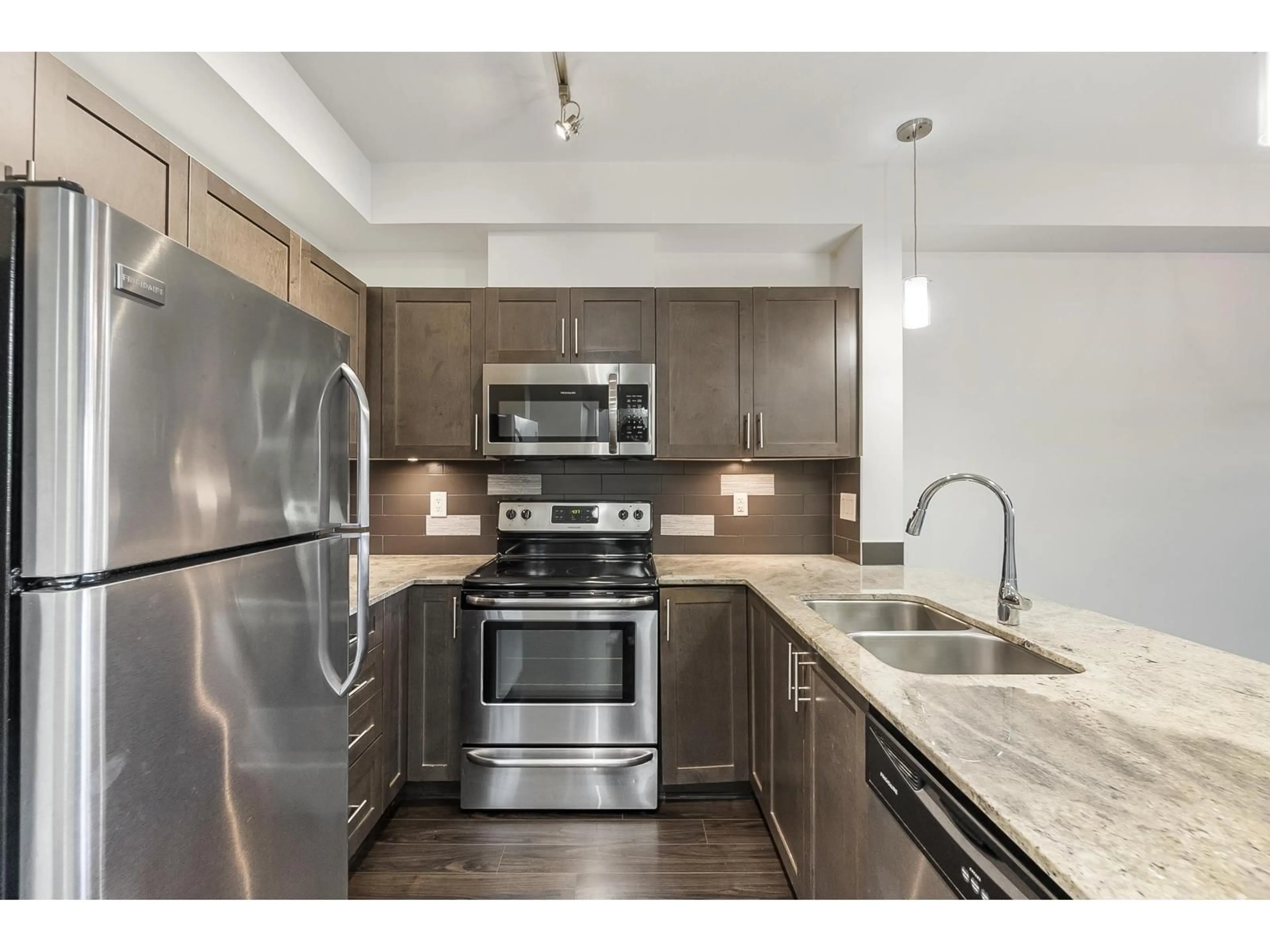 Open concept kitchen, unknown for L115 - 13468 KING GEORGE BOULEVARD, Surrey British Columbia V3T0H5