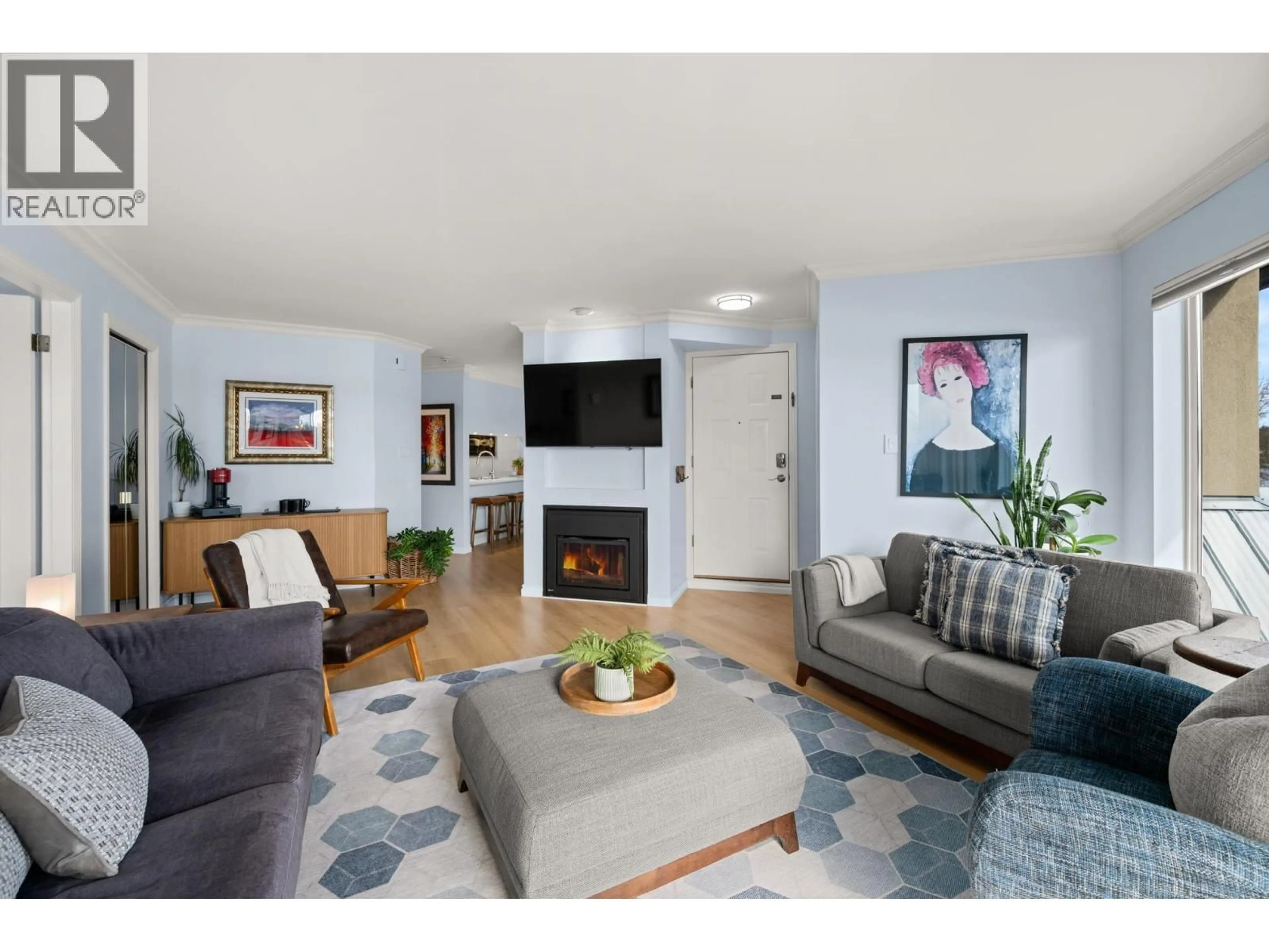 Living room with furniture, unknown for 211 - 31 RELIANCE COURT, New Westminster British Columbia V3M6C6