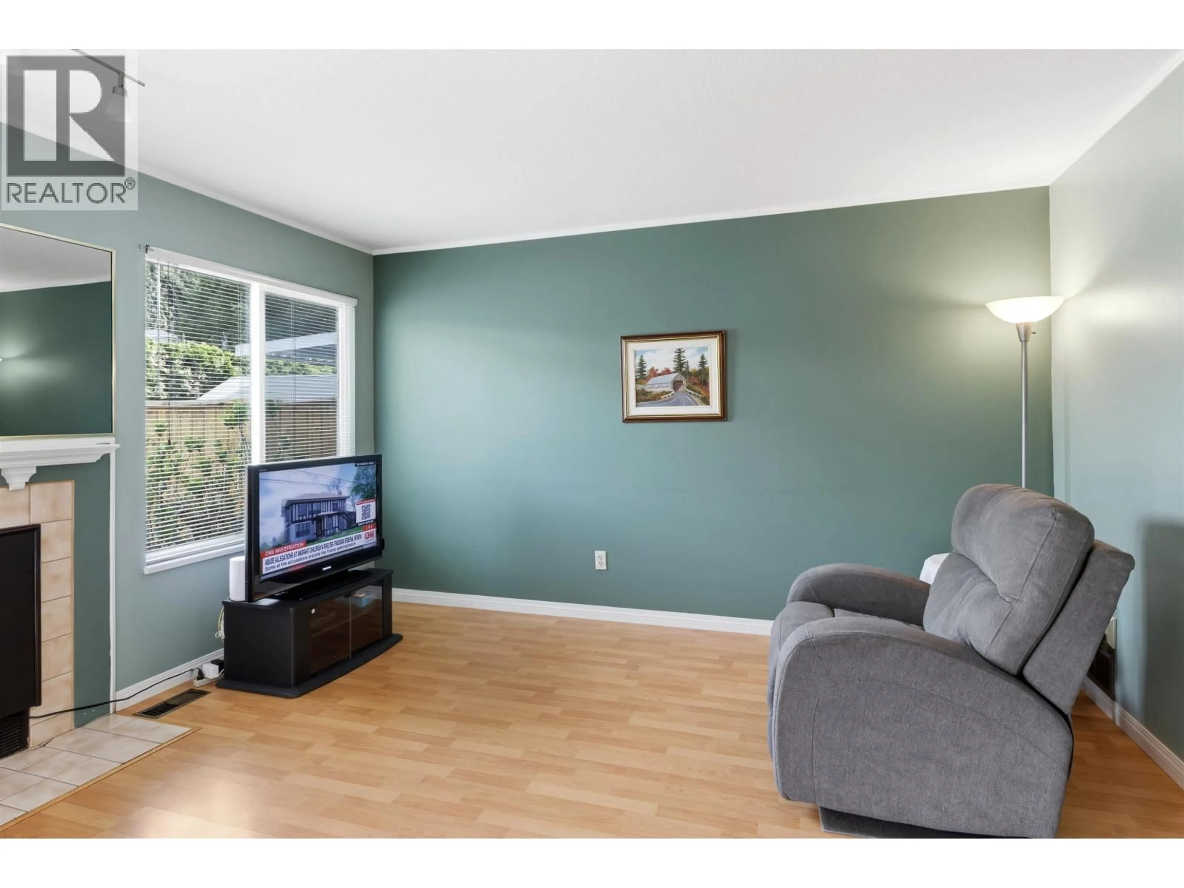Living room with furniture, wood/laminate floor for 119 - 11255 HARRISON STREET, Maple Ridge British Columbia V2X0K1