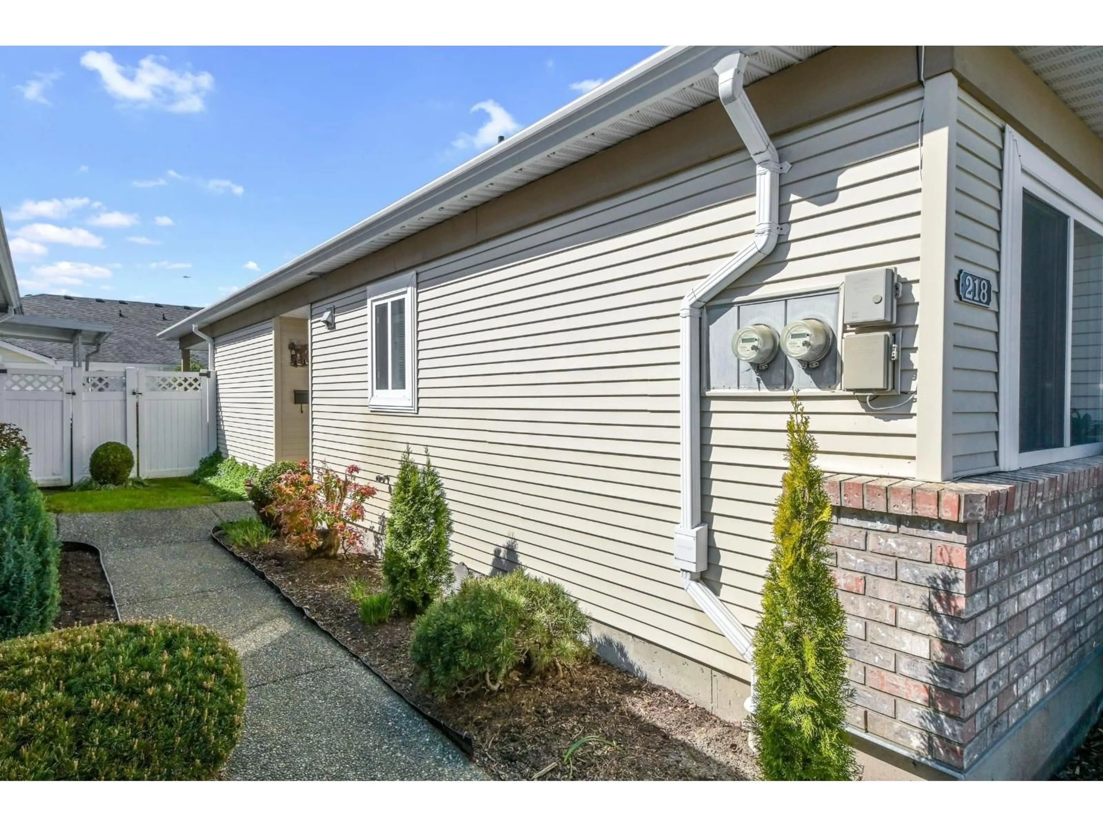Home with vinyl exterior material, street for 218 - 8485 YOUNG ROAD, Chilliwack British Columbia V2P7Y7
