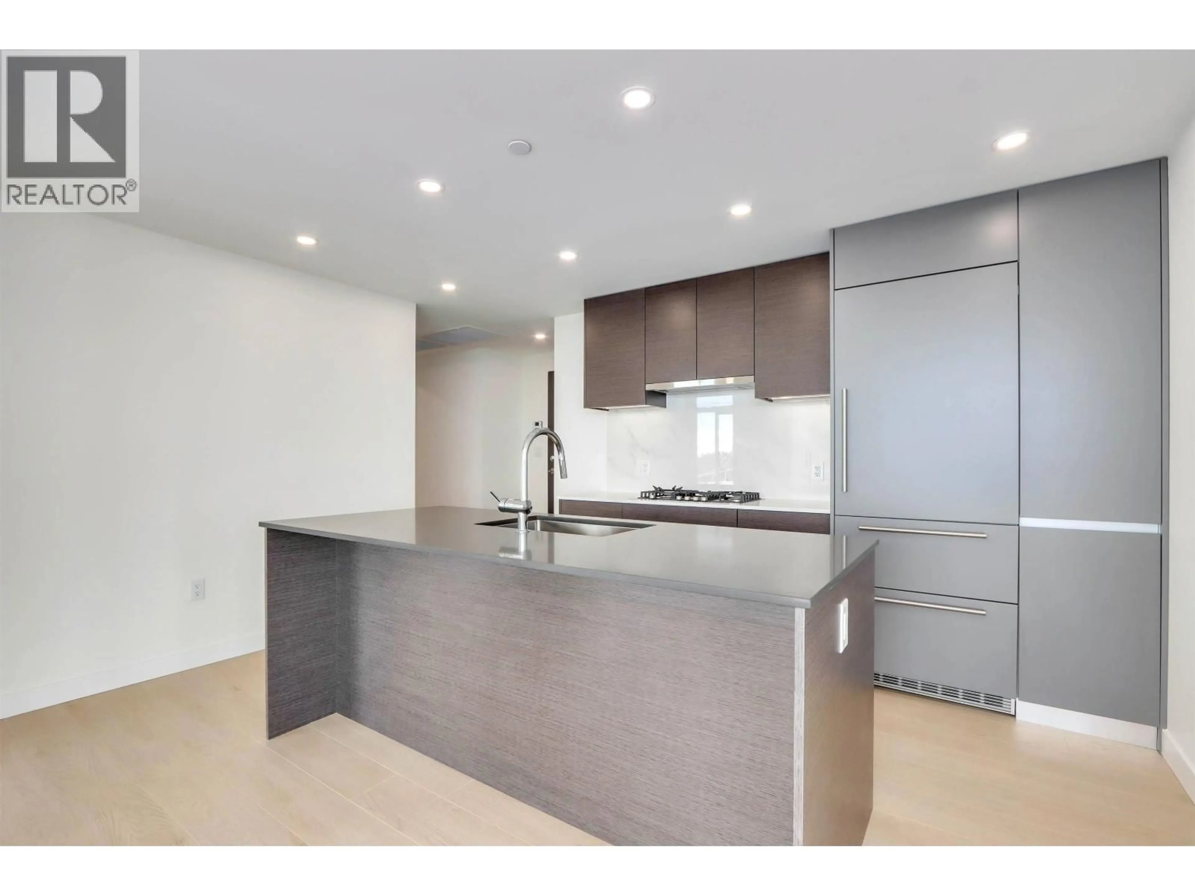 Open concept kitchen, unknown for 2204 - 200 KLAHANIE COURT, West Vancouver British Columbia V3H5K7