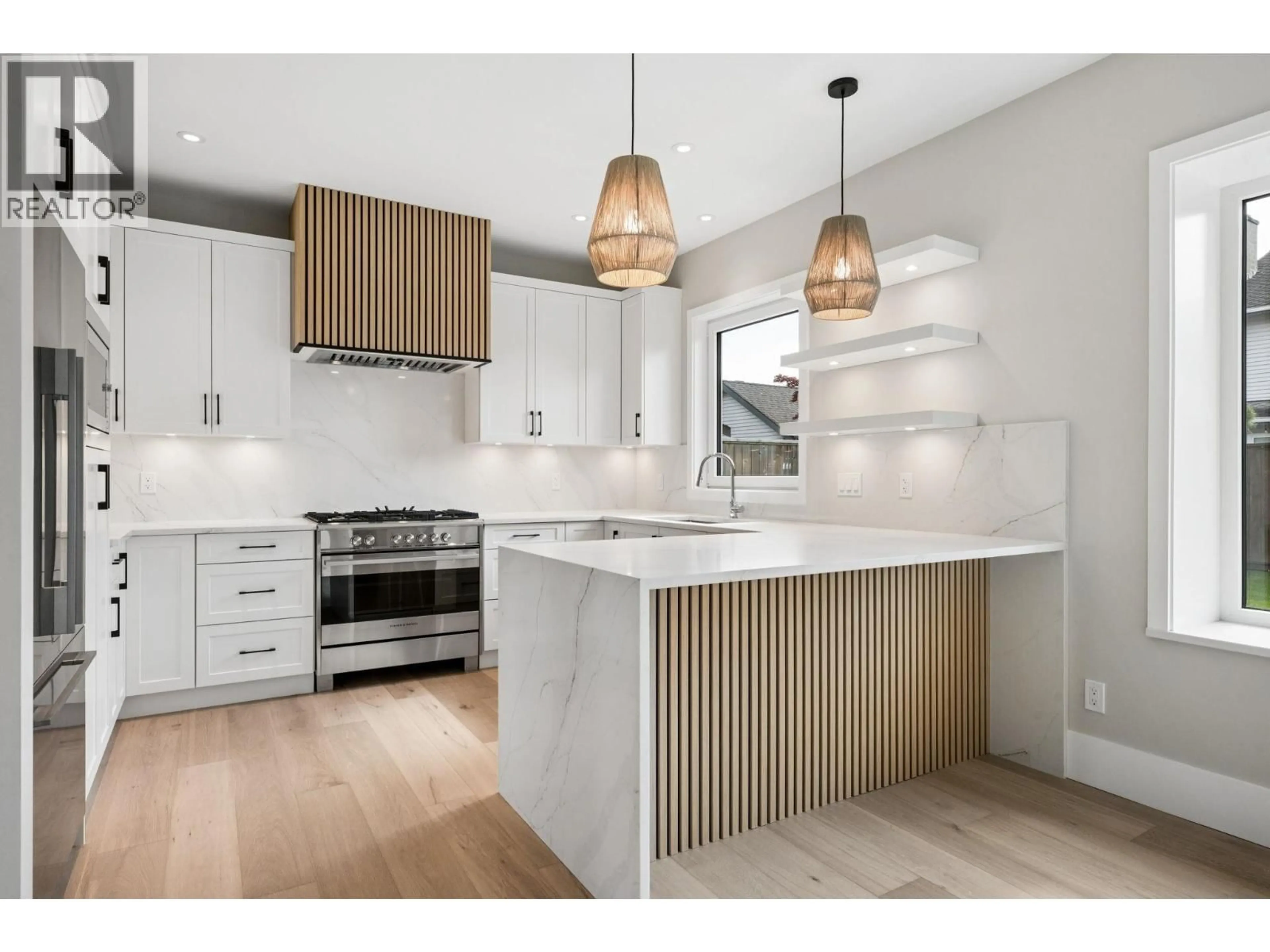 Open concept kitchen, wood/laminate floor for 5198 WESTMINSTER AVENUE, Delta British Columbia V4K2J2