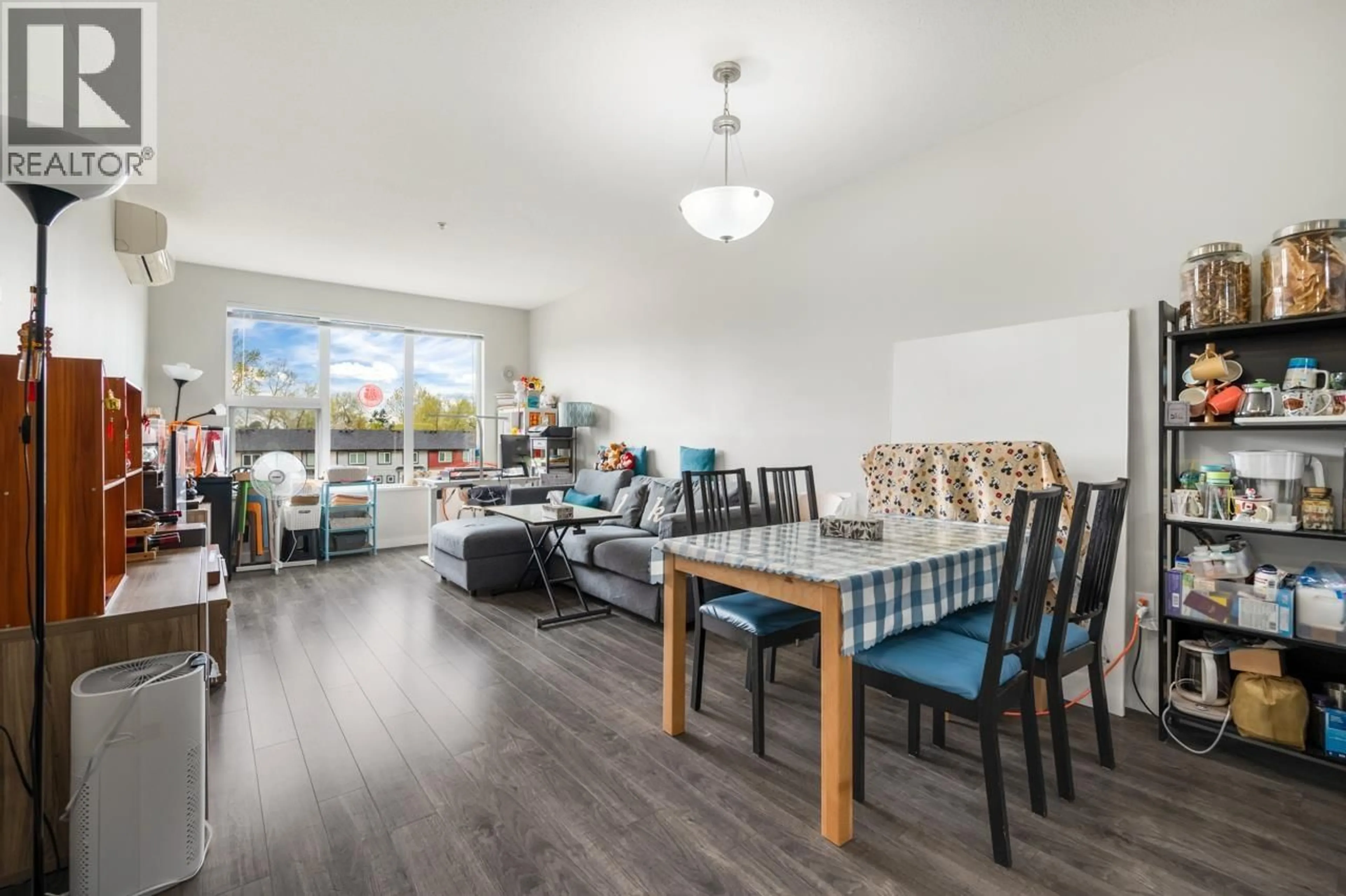 Living room with furniture, wood/laminate floor for 320 - 9311 ALEXANDRA ROAD, Richmond British Columbia V6X0L8