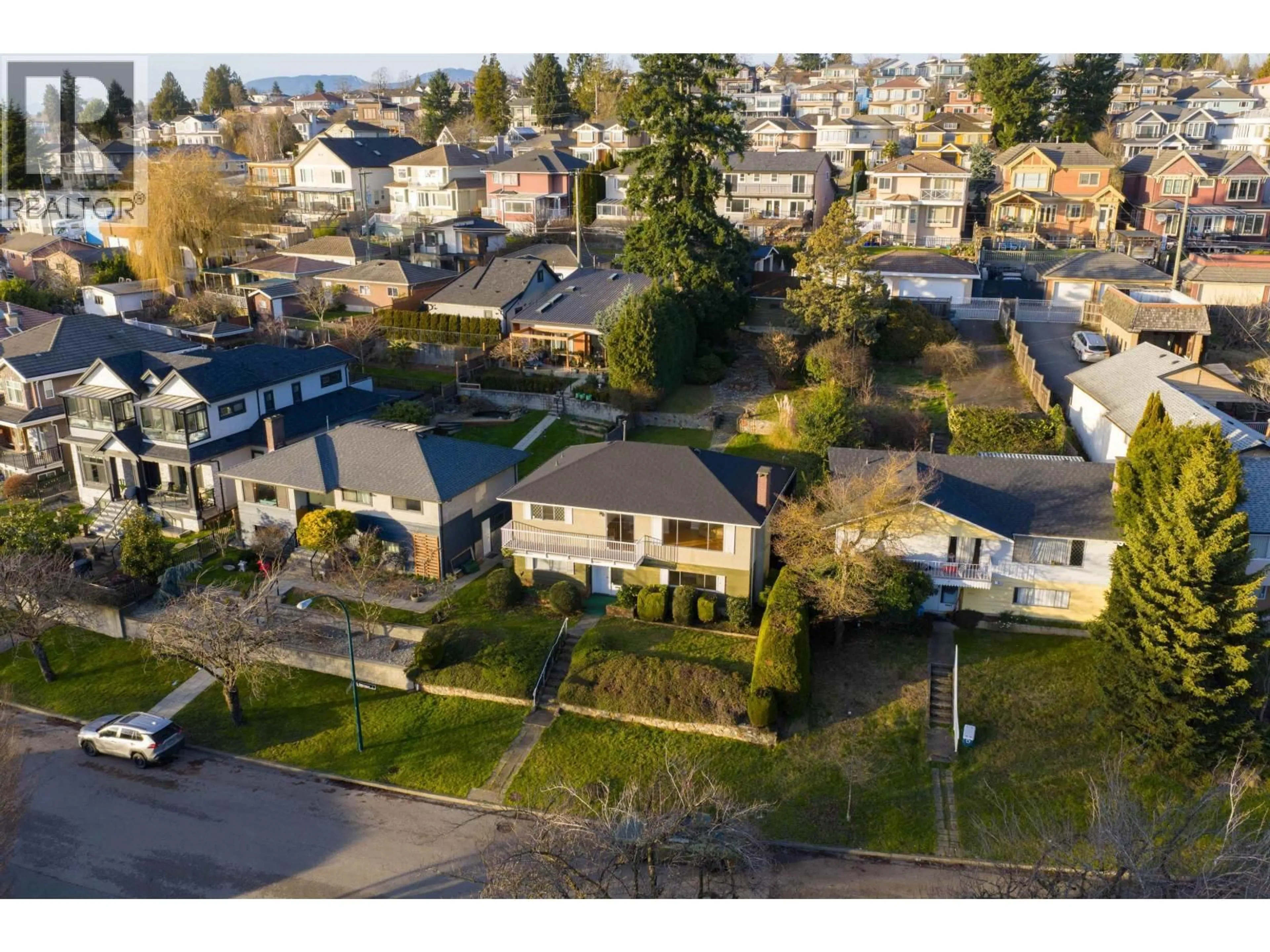 A pic from outside/outdoor area/front of a property/back of a property/a pic from drone, street for 2321 HARRISON DRIVE, Vancouver British Columbia V5P2P7