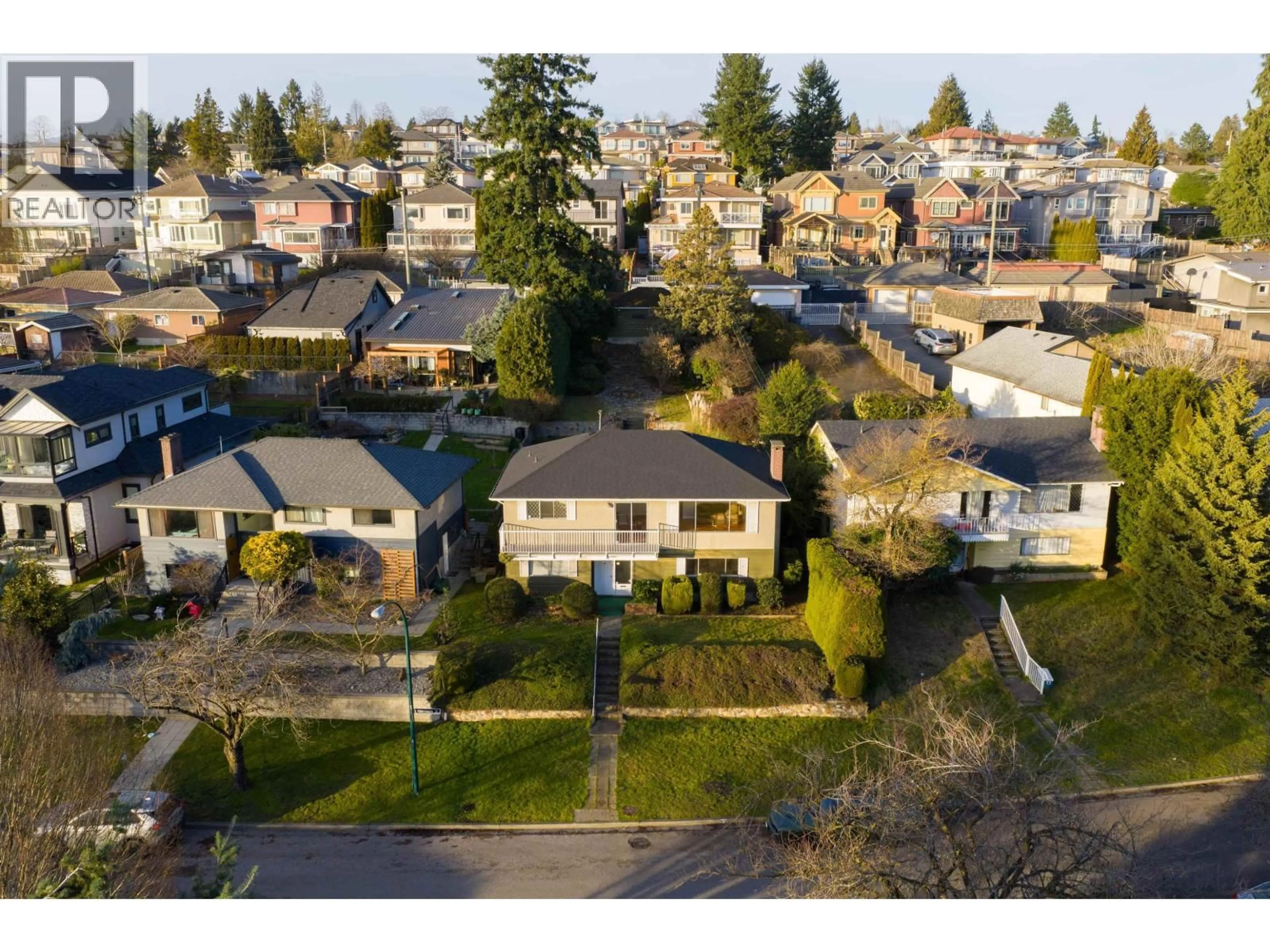A pic from outside/outdoor area/front of a property/back of a property/a pic from drone, street for 2321 HARRISON DRIVE, Vancouver British Columbia V5P2P7