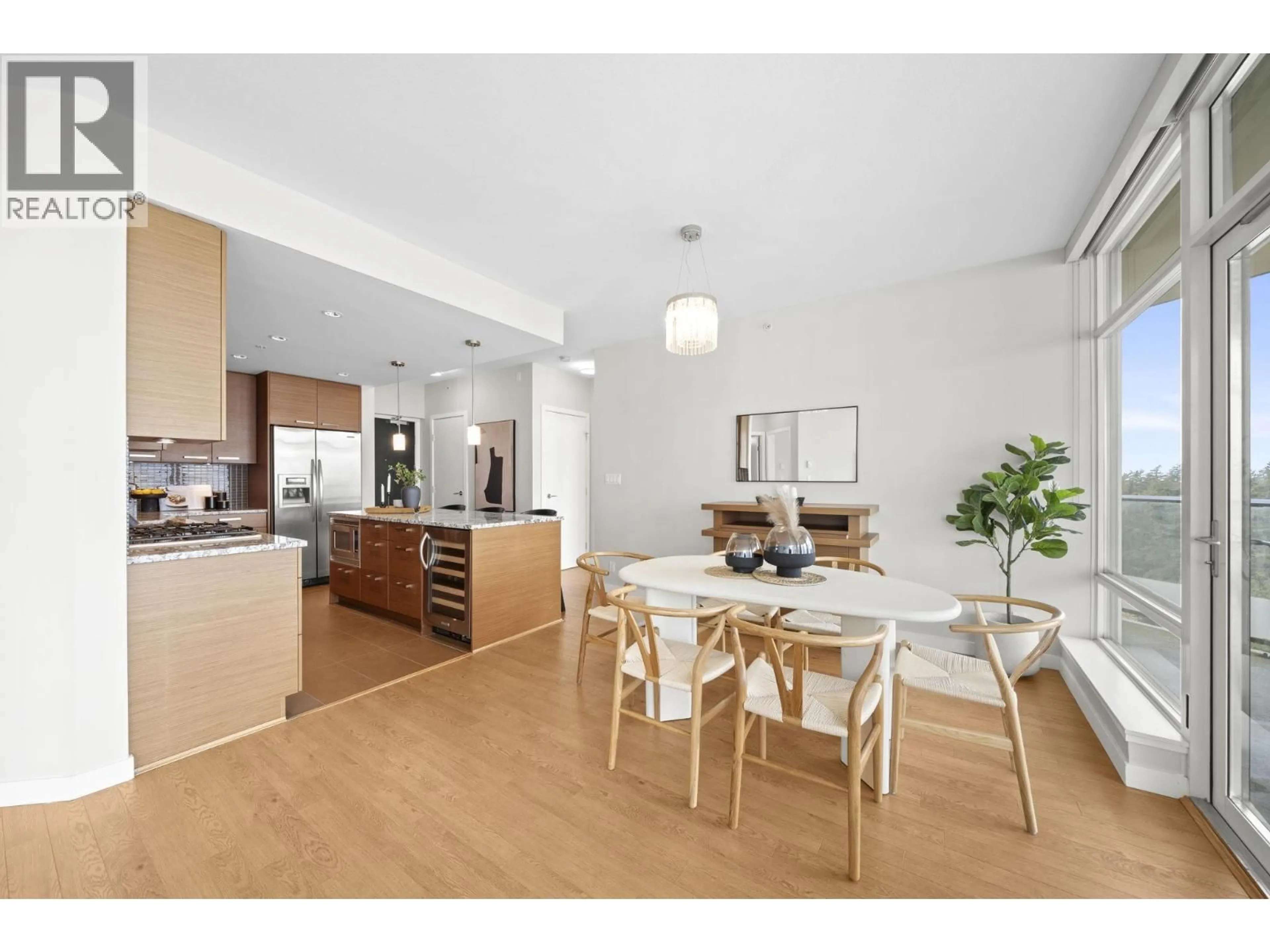 Open concept kitchen, wood/laminate floor for 1701 - 6188 WILSON AVENUE, Burnaby British Columbia V5H0A5