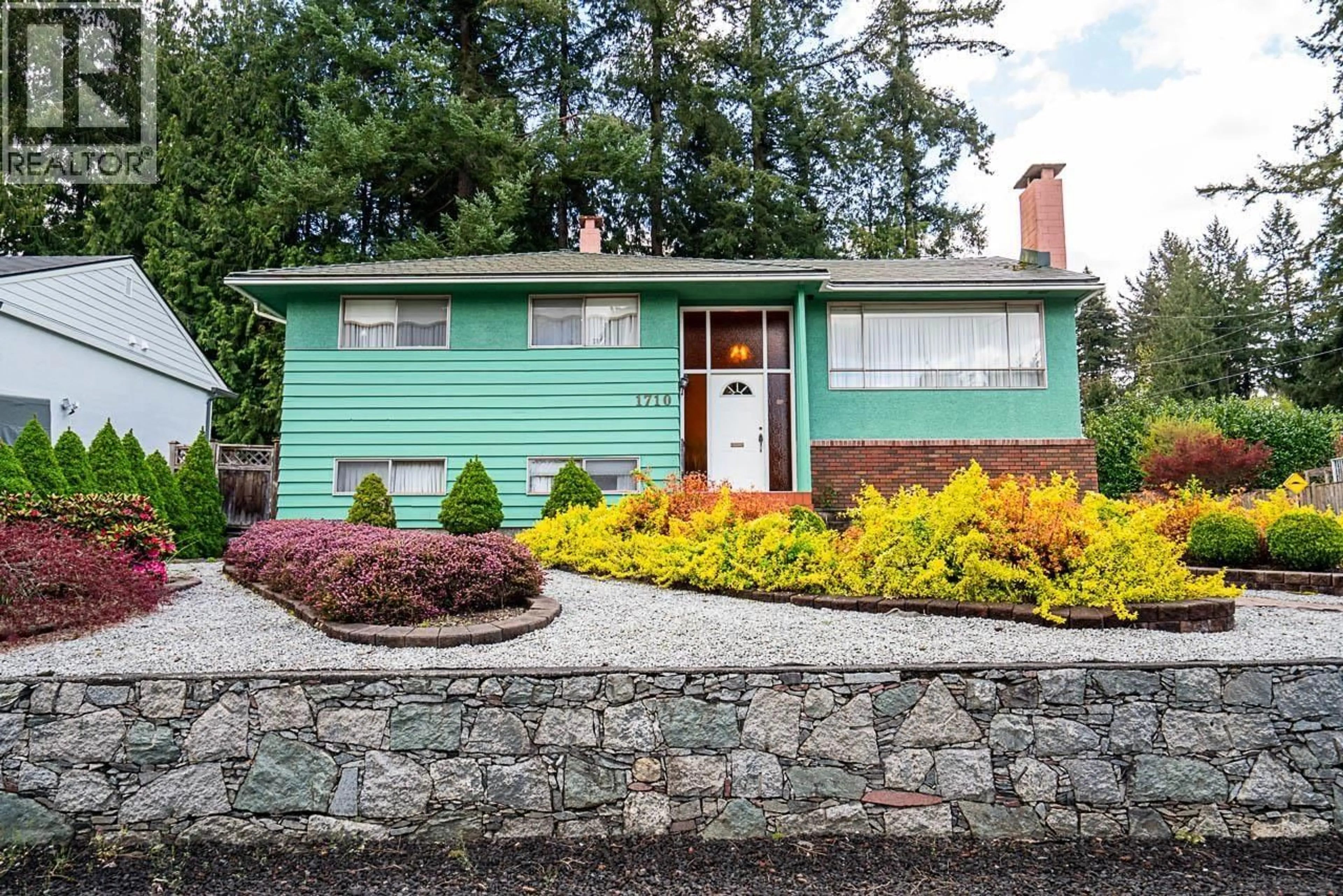 Home with vinyl exterior material, street for 1710 WESTERN DRIVE, Port Coquitlam British Columbia V3C2X3