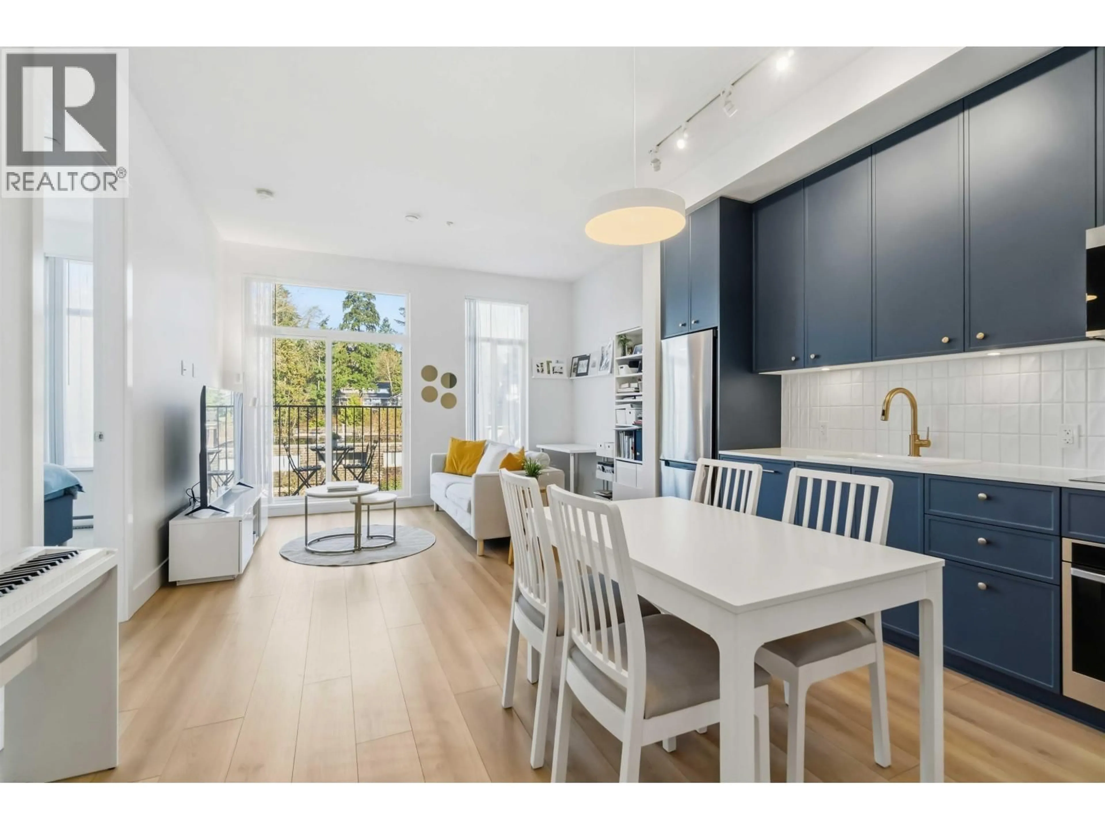 Open concept kitchen, wood/laminate floor for 310 - 718 EDGAR AVENUE, Coquitlam British Columbia V3K0H2