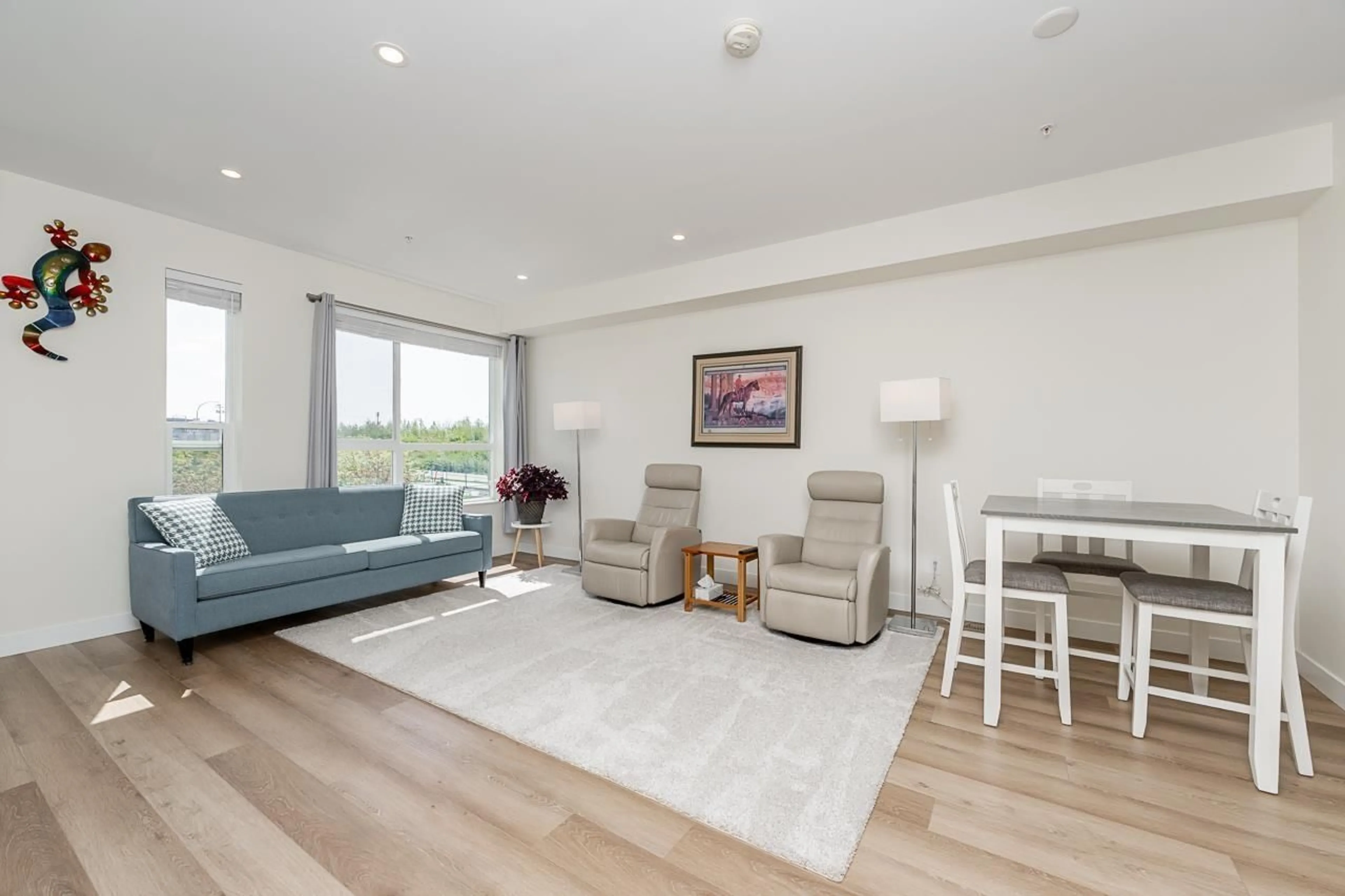 Living room with furniture, wood/laminate floor for 11 - 20134 81A AVENUE, Langley British Columbia V2Y4L4