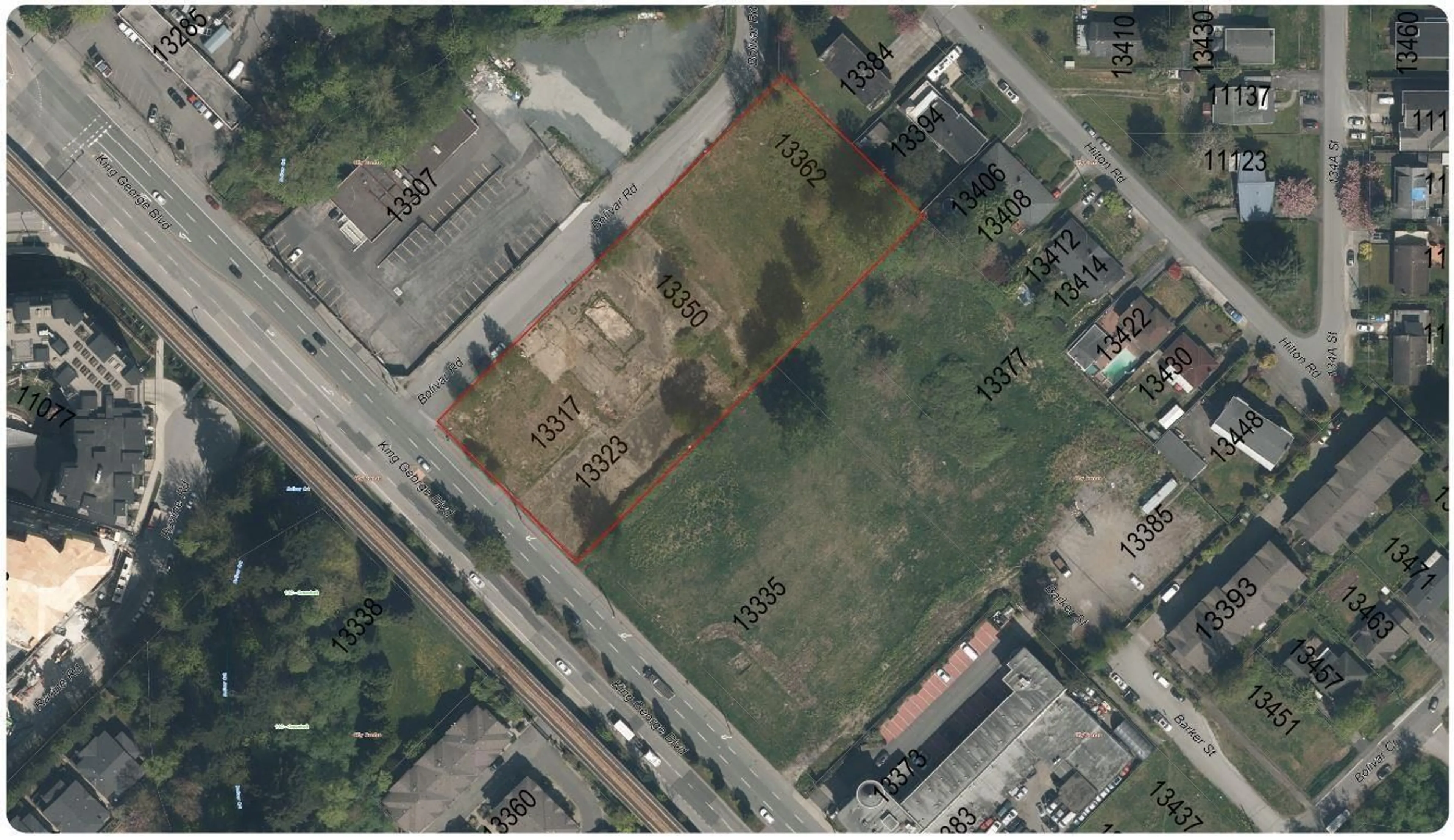 A pic from outside/outdoor area/front of a property/back of a property/a pic from drone, building for 13317 KING GEORGE BOULEVARD, Surrey British Columbia V3T2T5