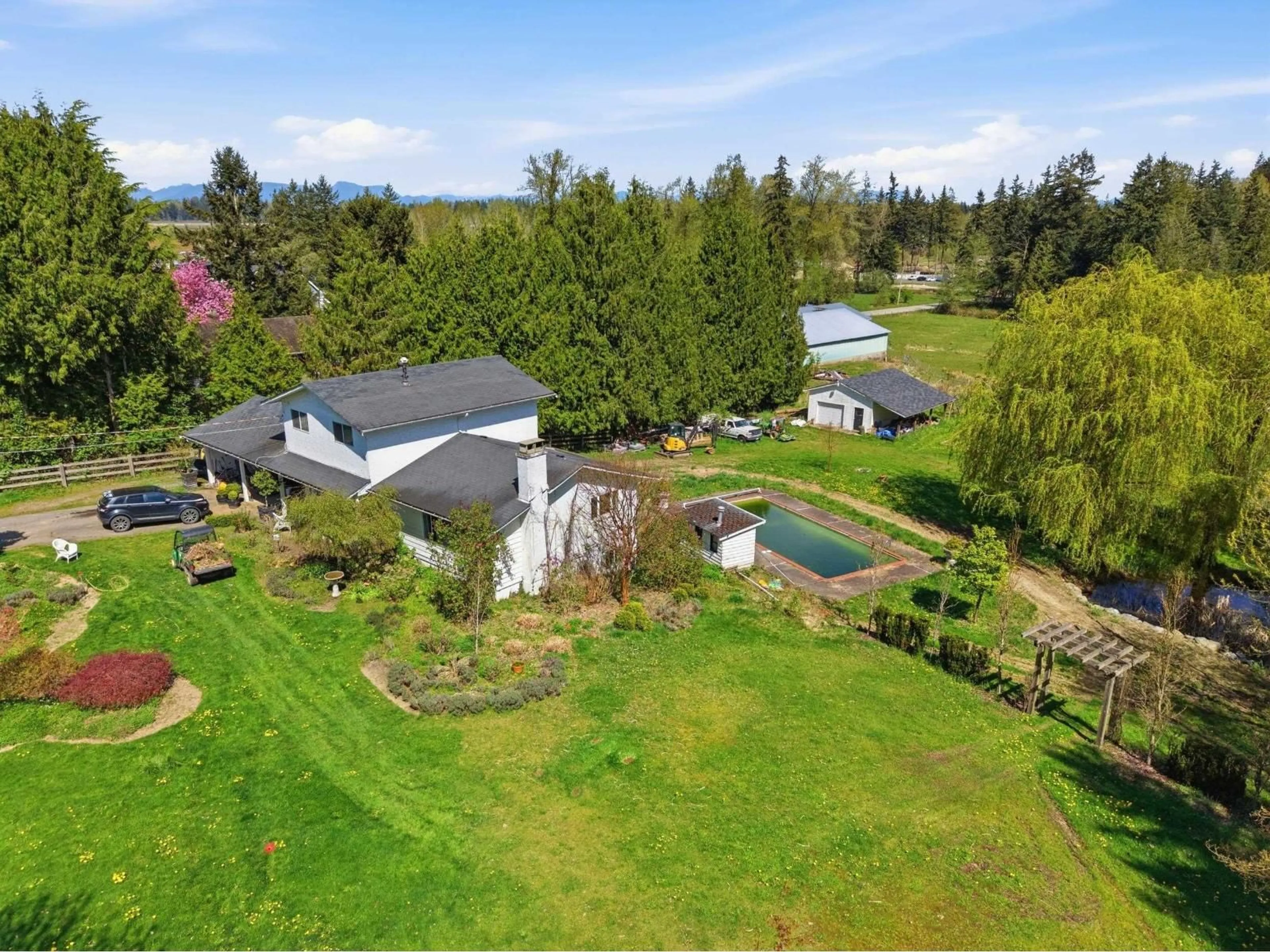 A pic from outside/outdoor area/front of a property/back of a property/a pic from drone, water/lake/river/ocean view for 1358 227 STREET, Langley British Columbia V2Z2W8