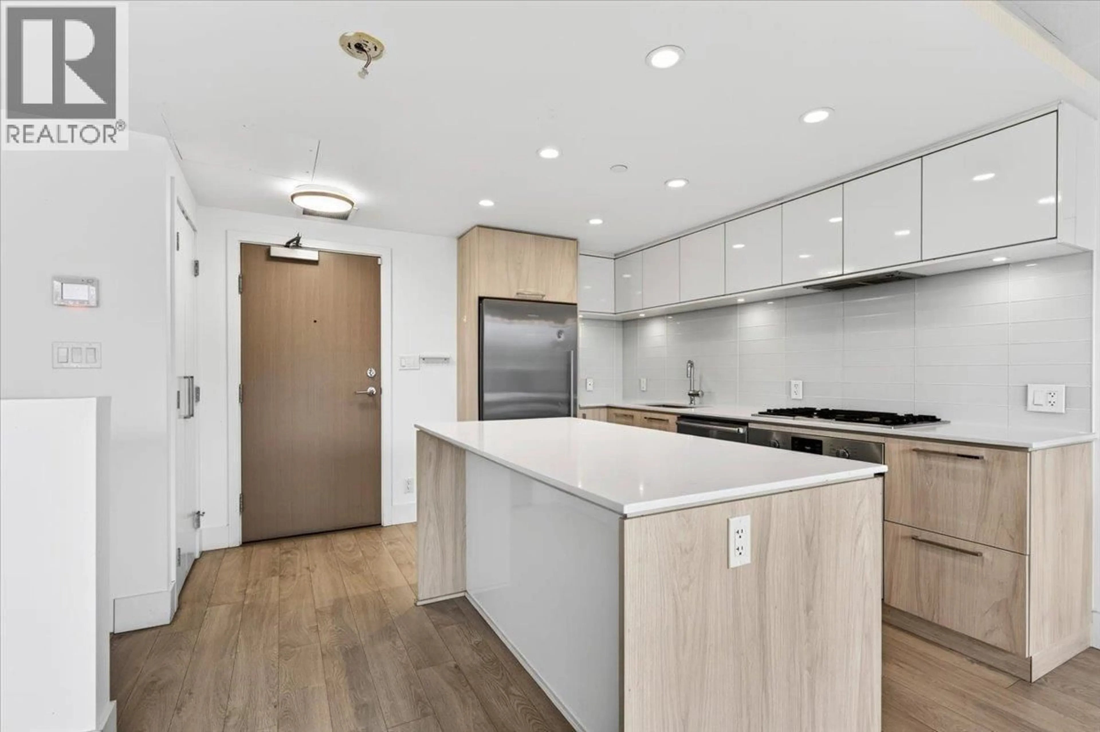 Open concept kitchen, unknown for 610 - 680 SEYLYNN CRESCENT, North Vancouver British Columbia V7J0B5