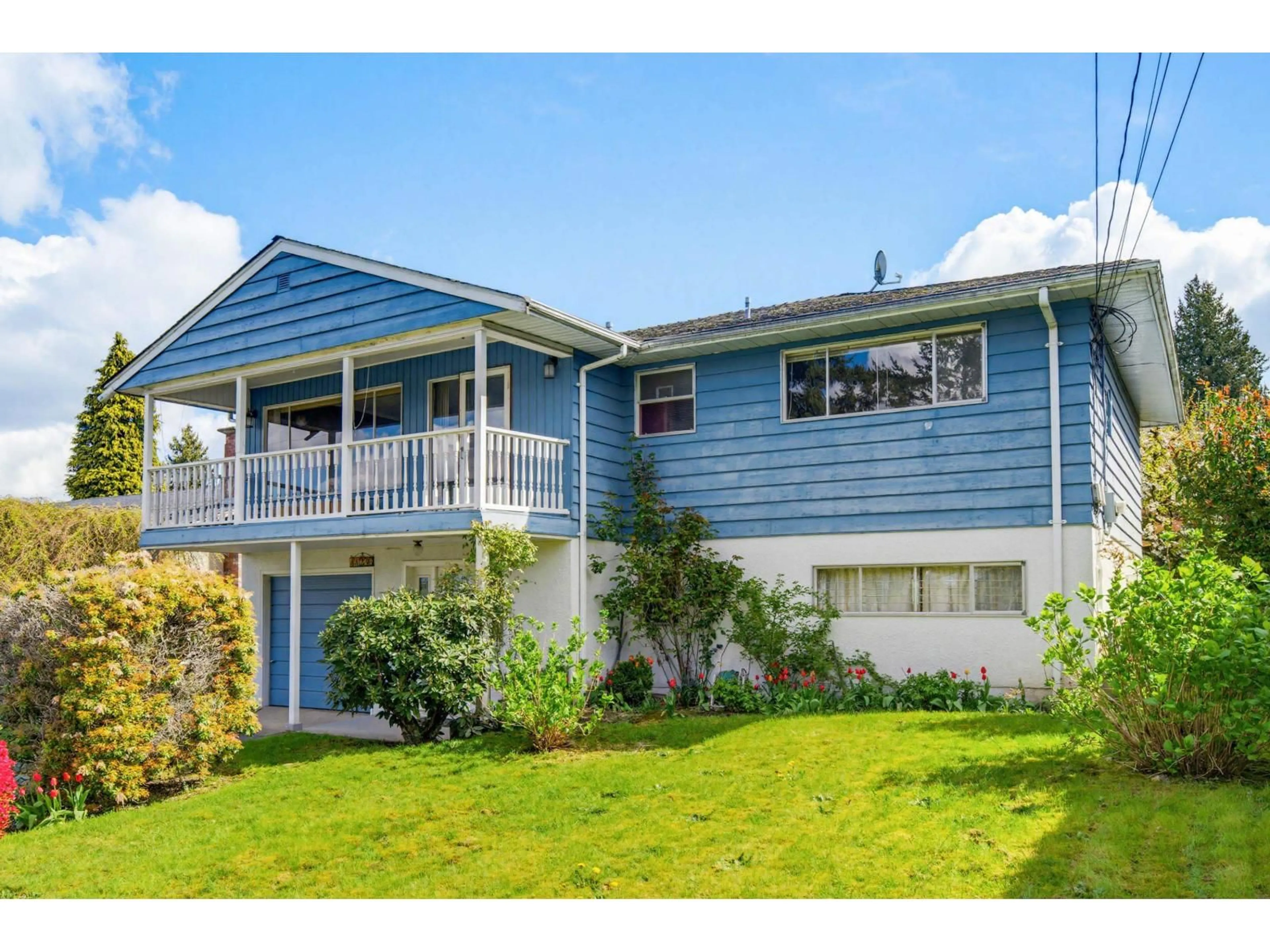 Home with vinyl exterior material, street for 11236 135 STREET, Surrey British Columbia V3R2Z7