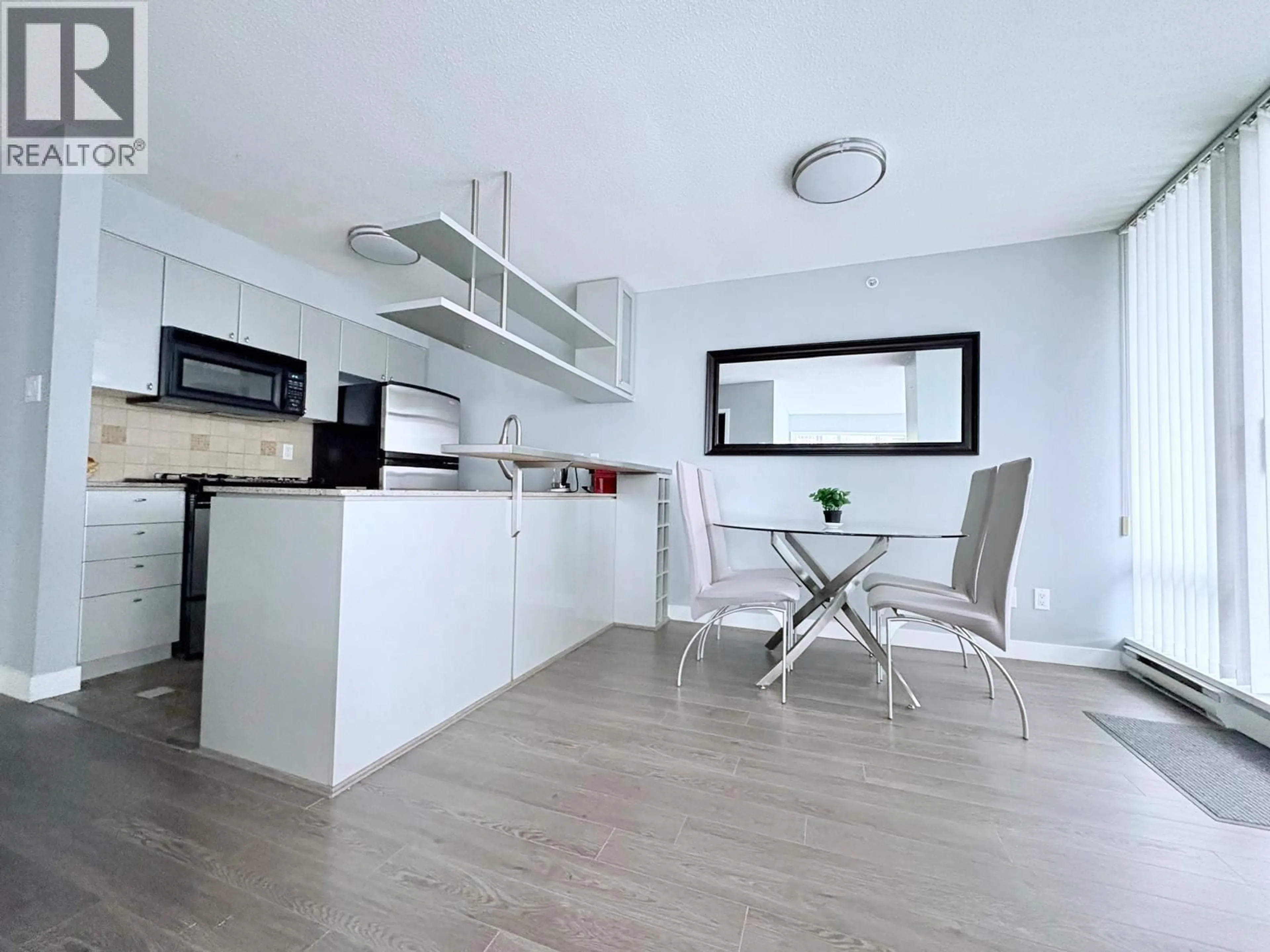 Open concept kitchen, wood/laminate floor for 2706 - 1438 RICHARDS STREET, Vancouver British Columbia V6Z3B8