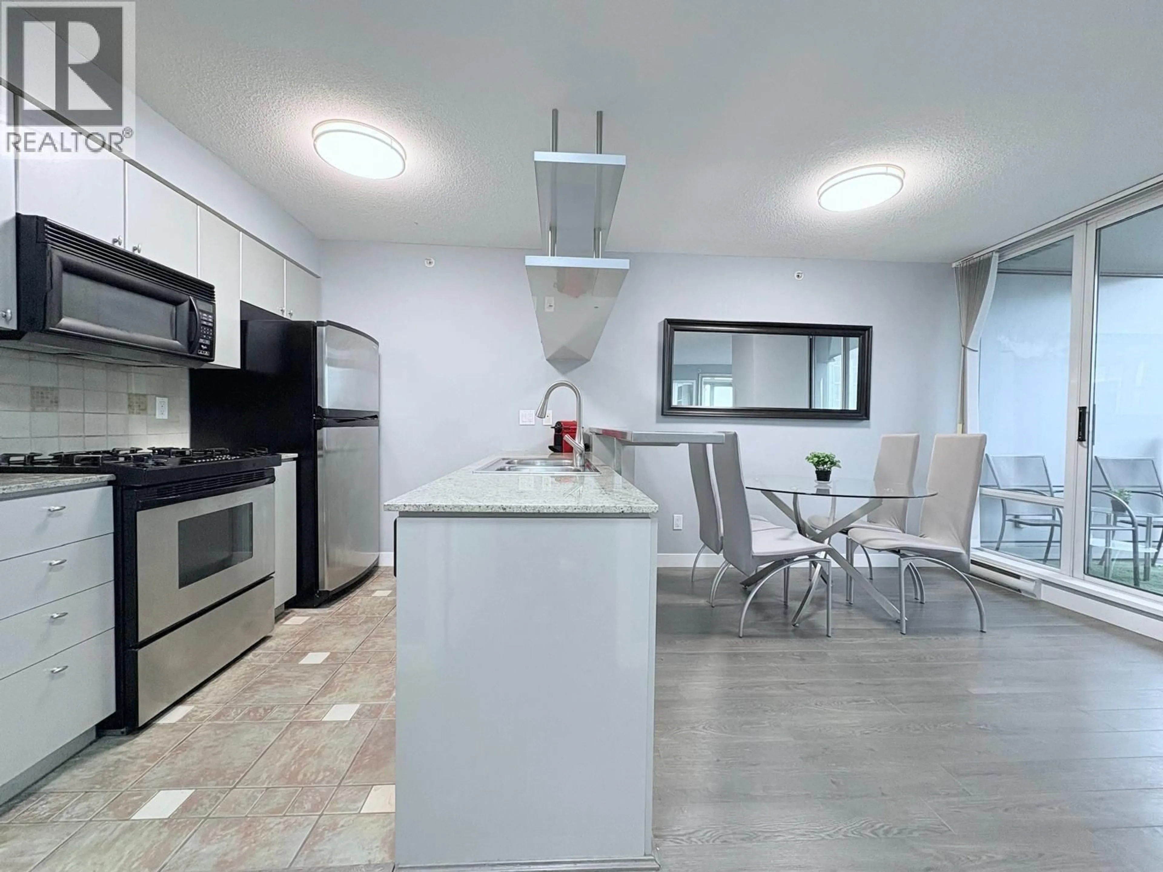Open concept kitchen, ceramic/tile floor for 2706 - 1438 RICHARDS STREET, Vancouver British Columbia V6Z3B8