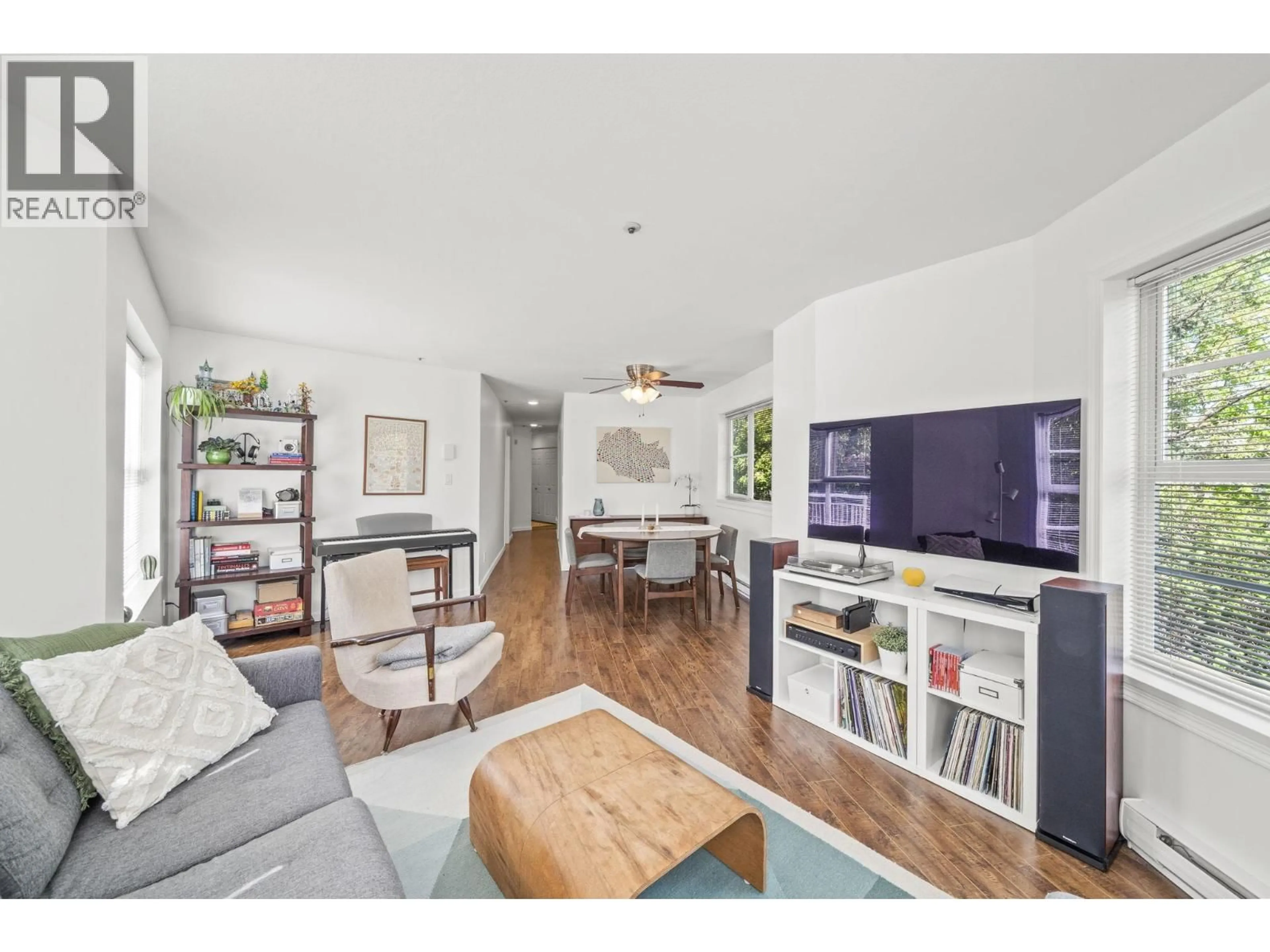 Living room with furniture, wood/laminate floor for 204 - 1883 10TH AVENUE, Vancouver British Columbia V5N1X8