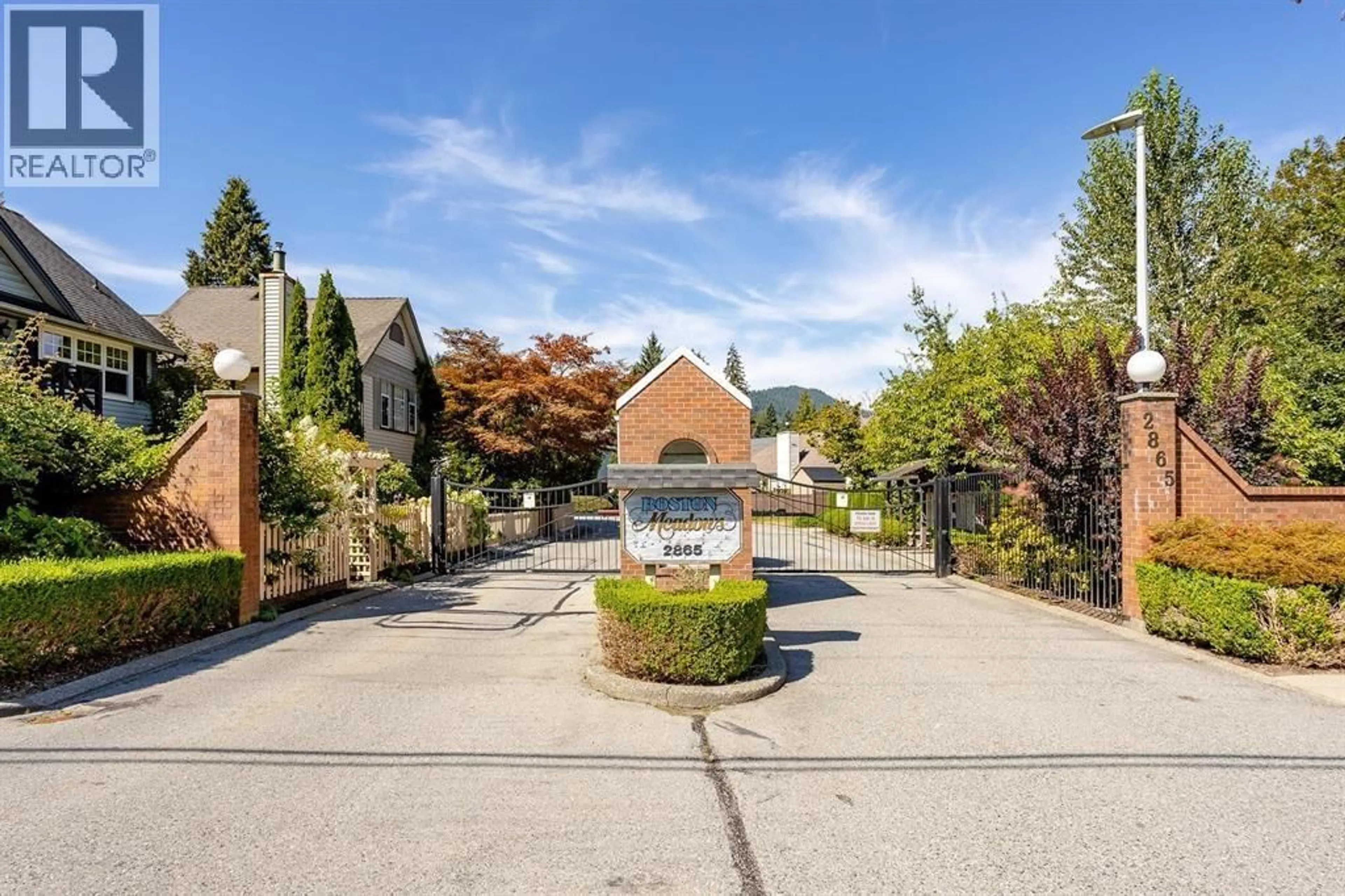 A pic from outside/outdoor area/front of a property/back of a property/a pic from drone, street for 55 - 2865 GLEN DRIVE, Coquitlam British Columbia V3B6W4