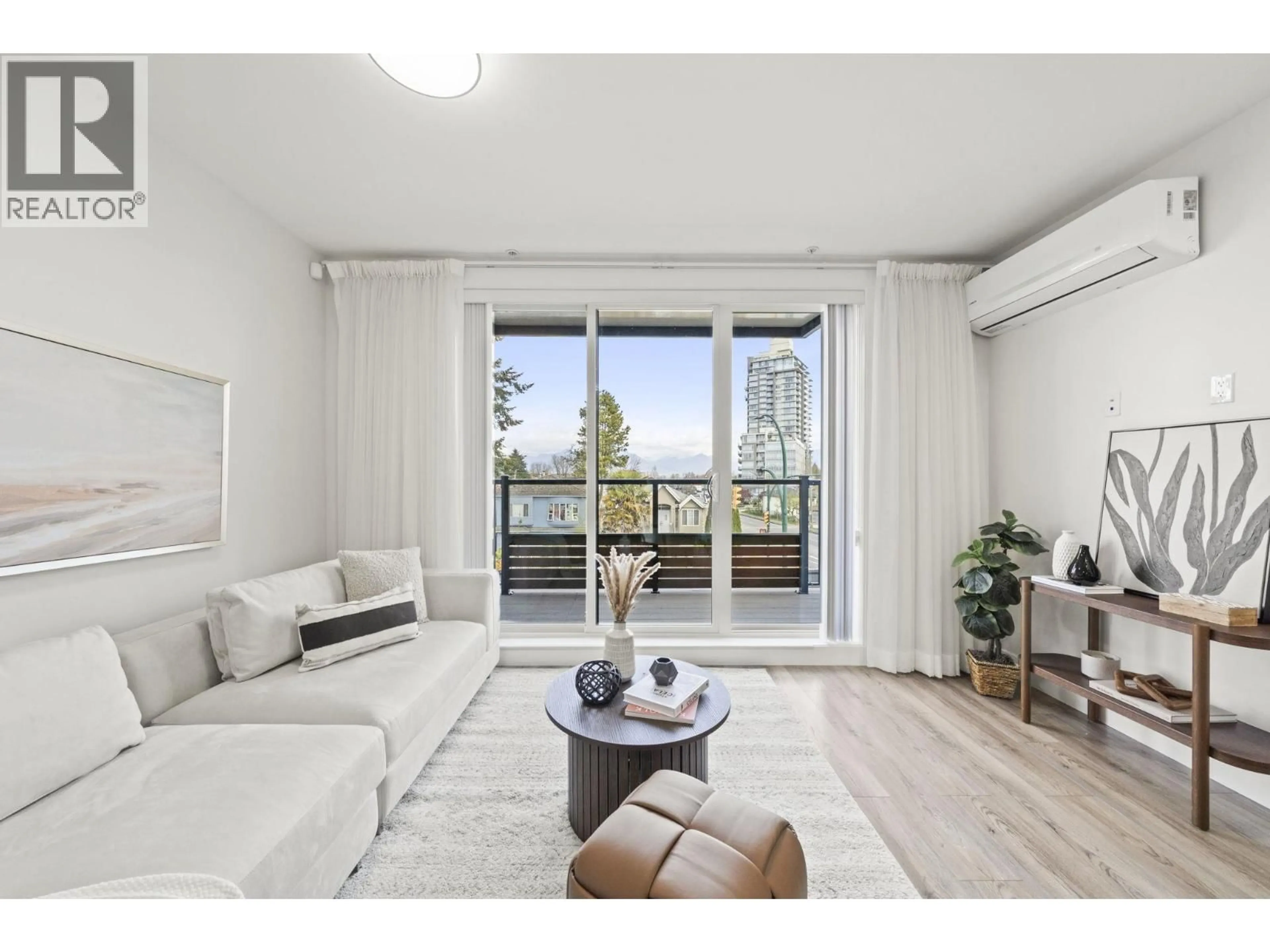 Living room with furniture, wood/laminate floor for 2296 33RD AVENUE, Vancouver British Columbia V5N3G1