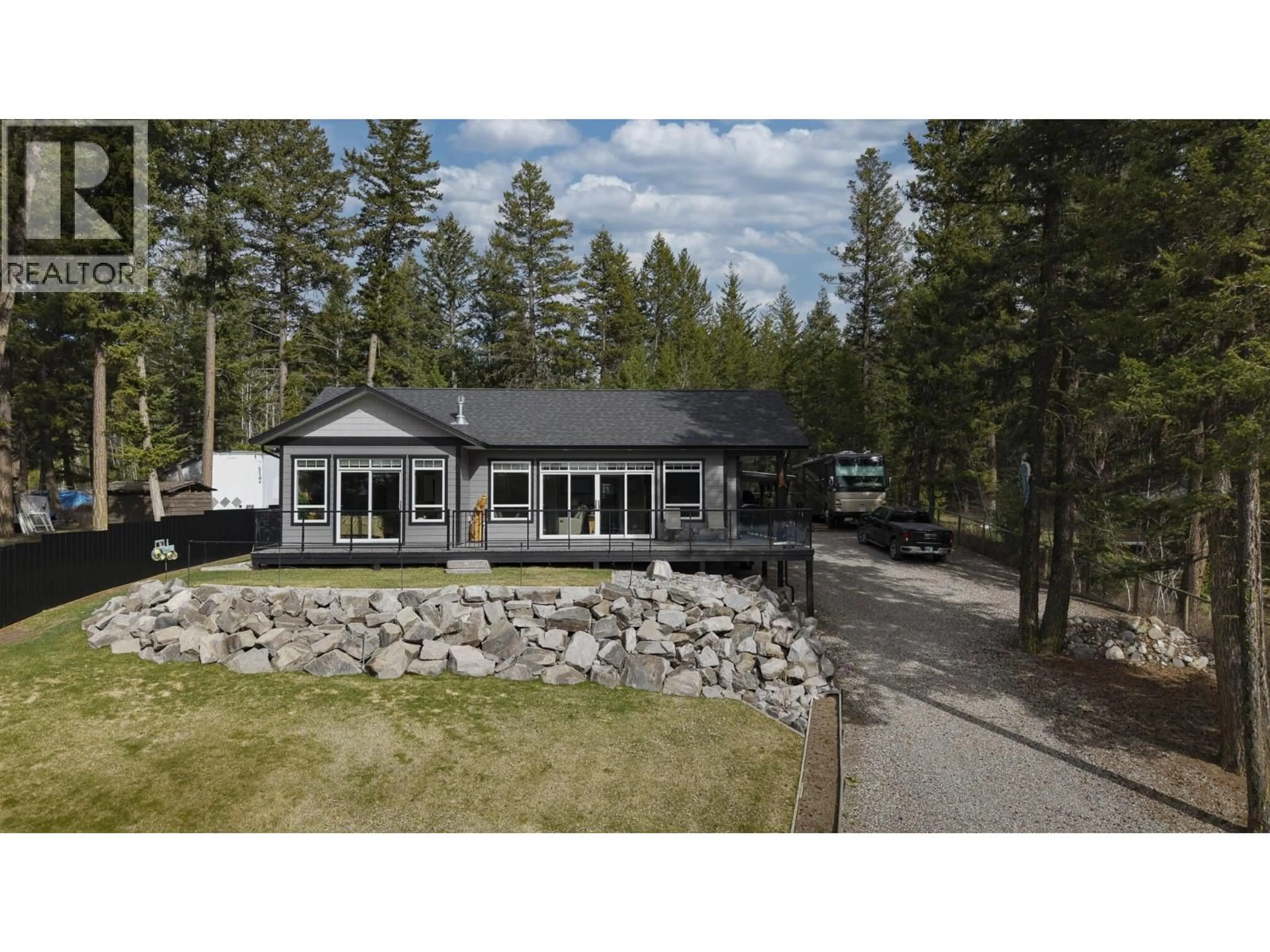 A pic from outside/outdoor area/front of a property/back of a property/a pic from drone, unknown for 3779 EMERALD CRESCENT, Lac La Hache British Columbia V0K1T1