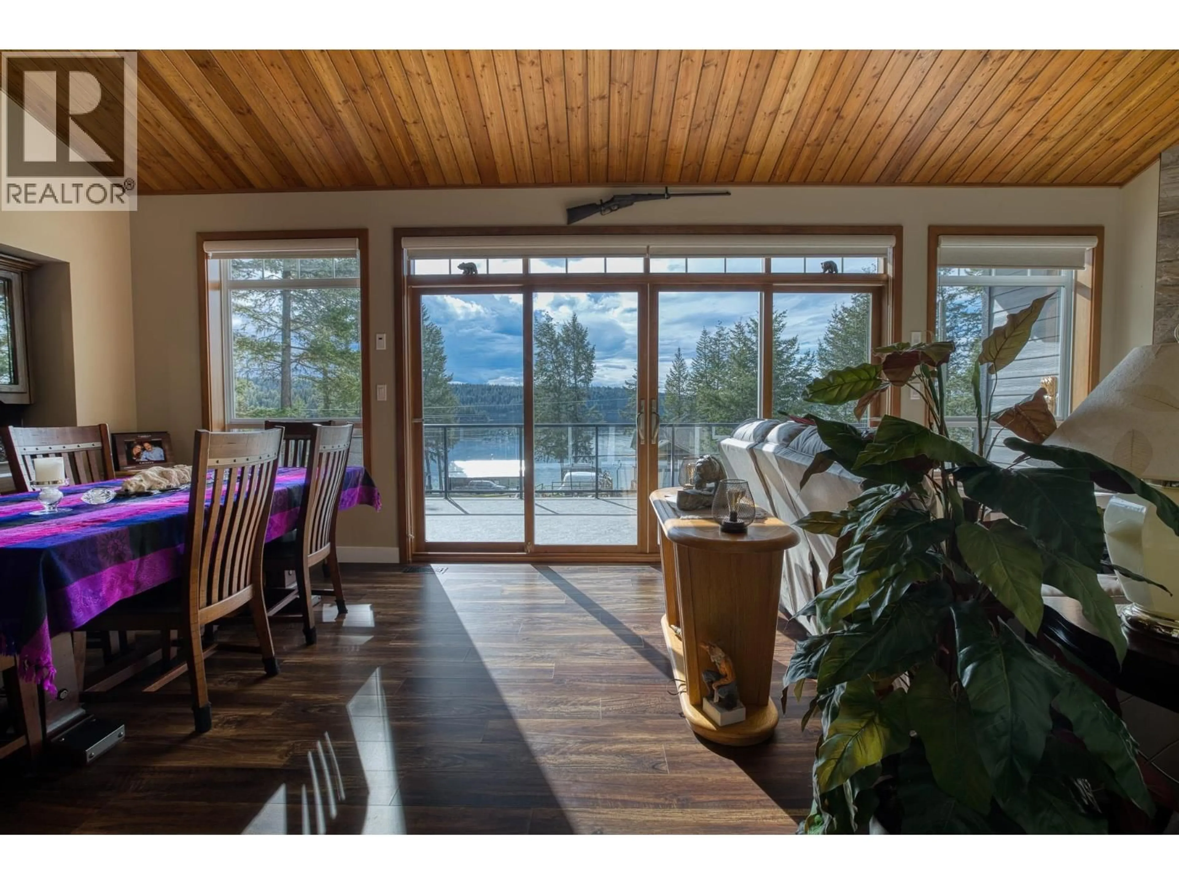 Dining room, wood/laminate floor for 3779 EMERALD CRESCENT, Lac La Hache British Columbia V0K1T1