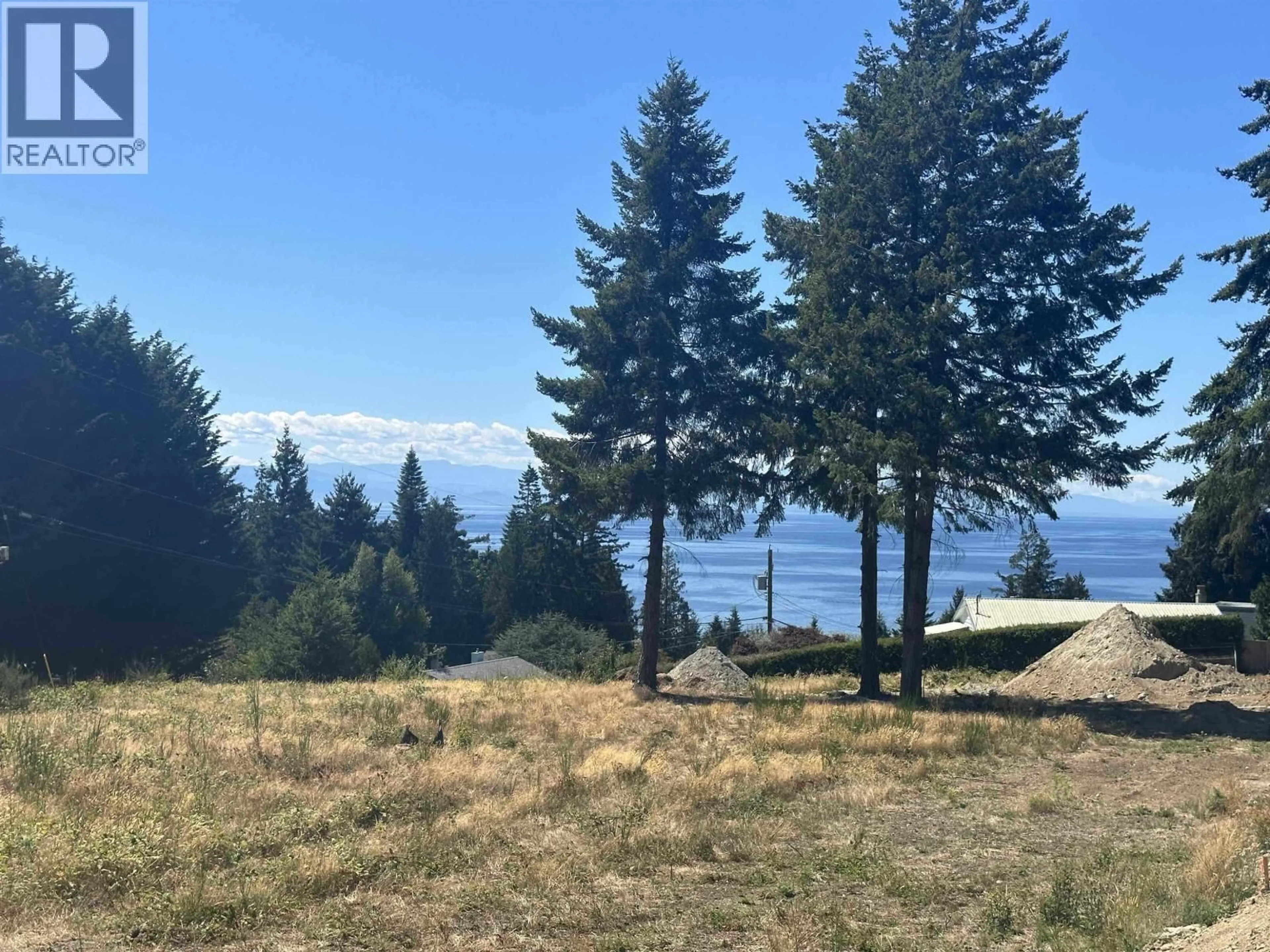 A pic from outside/outdoor area/front of a property/back of a property/a pic from drone, water/lake/river/ocean view for 5112 CHAPMAN ROAD, Sechelt British Columbia V7Z0G4