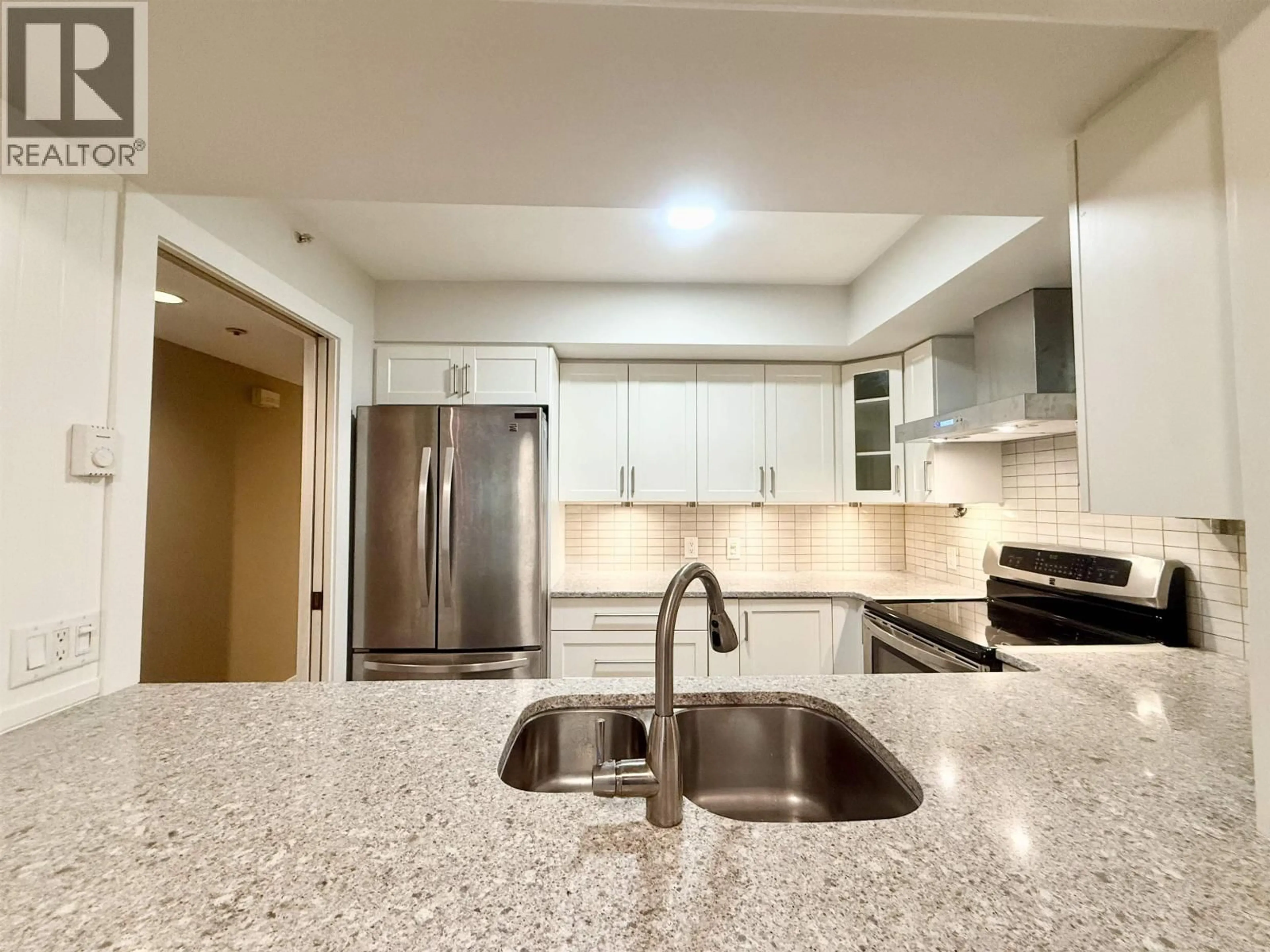 Open concept kitchen, ceramic/tile floor for 103 - 3189 CAMOSUN STREET, Vancouver British Columbia V6R3X2