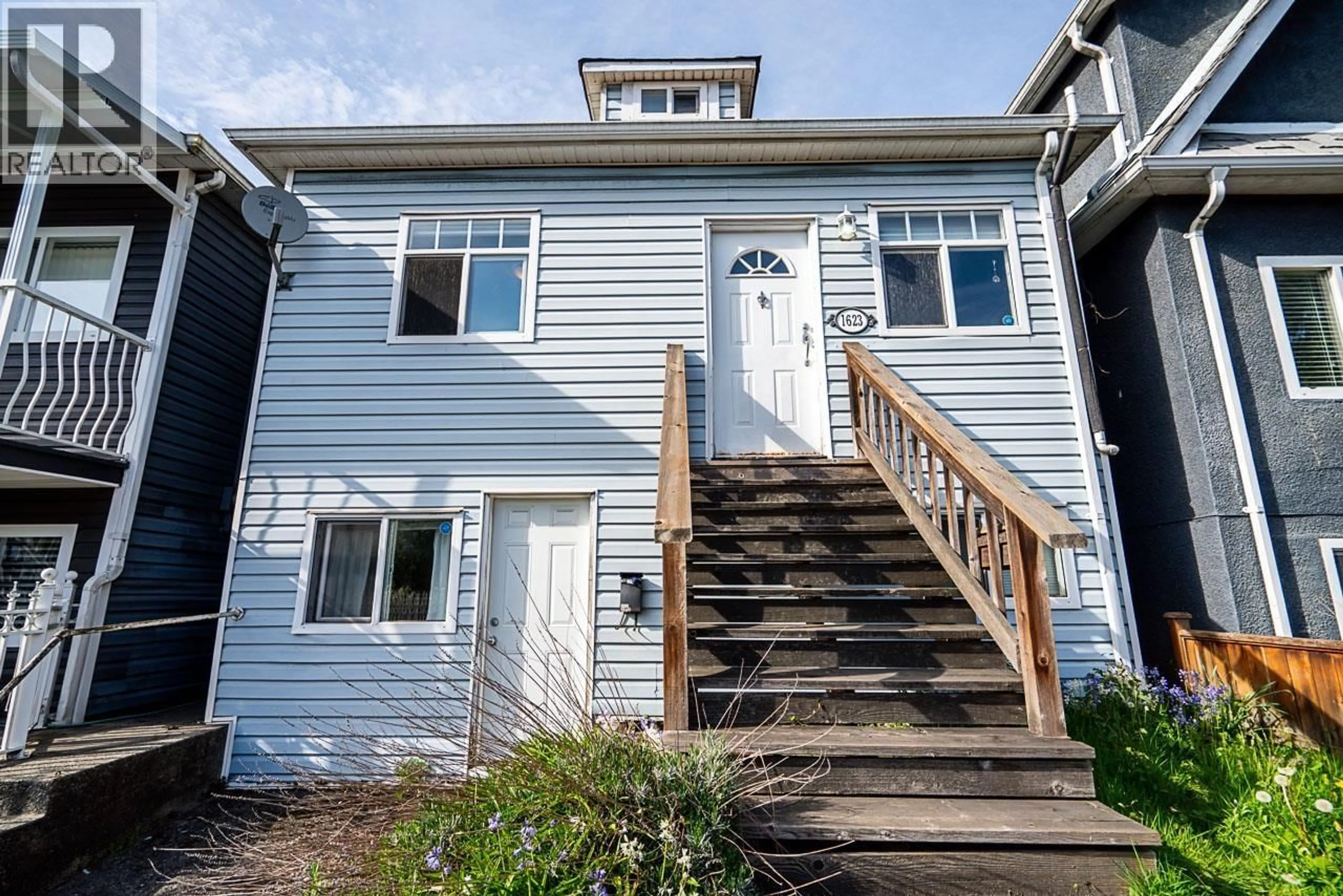 Home with vinyl exterior material, street for 1623 12TH AVENUE, Vancouver British Columbia V5N2A2