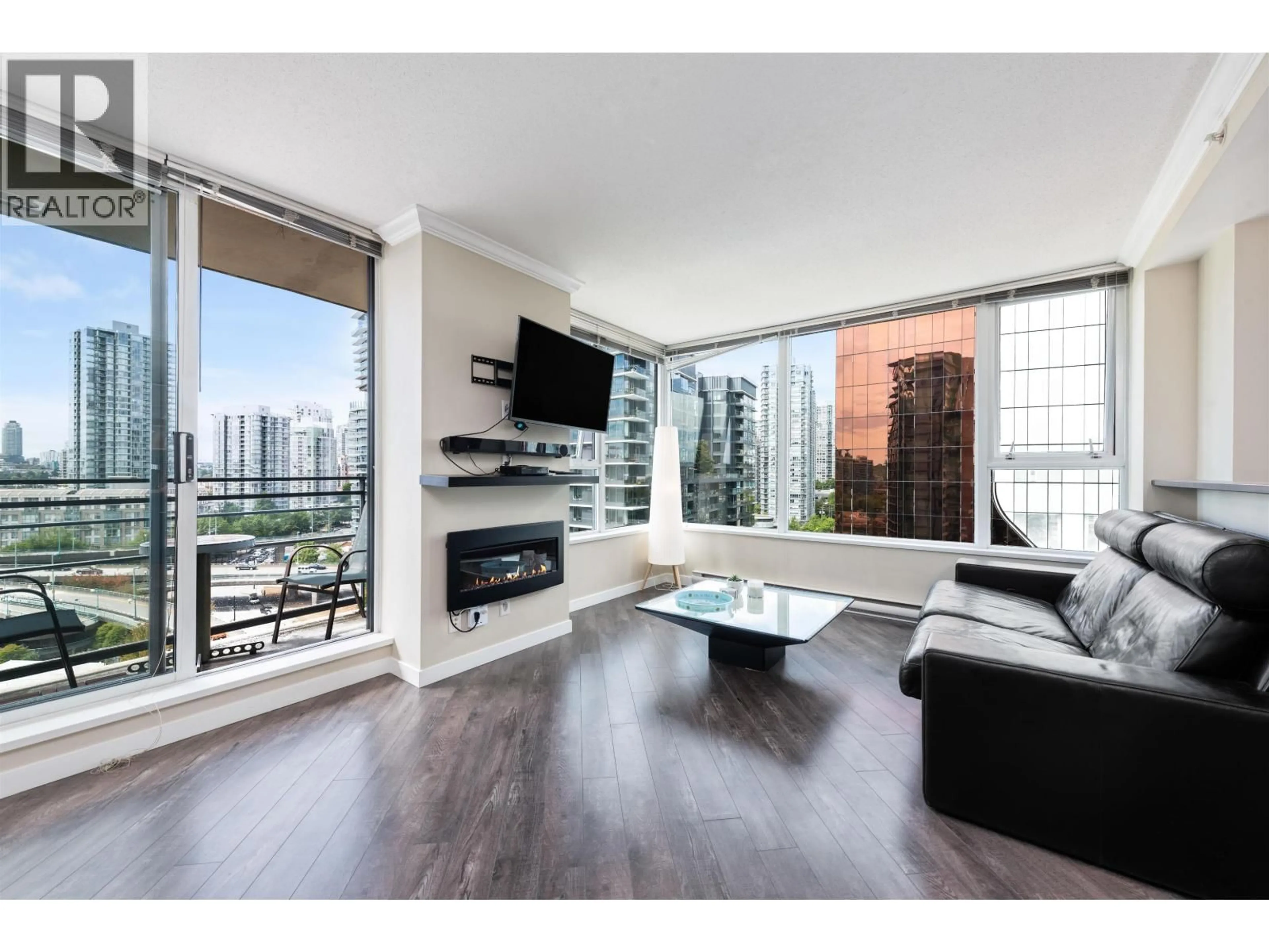 Living room with furniture, wood/laminate floor for 1606 - 33 SMITHE STREET, Vancouver British Columbia V6B0B5
