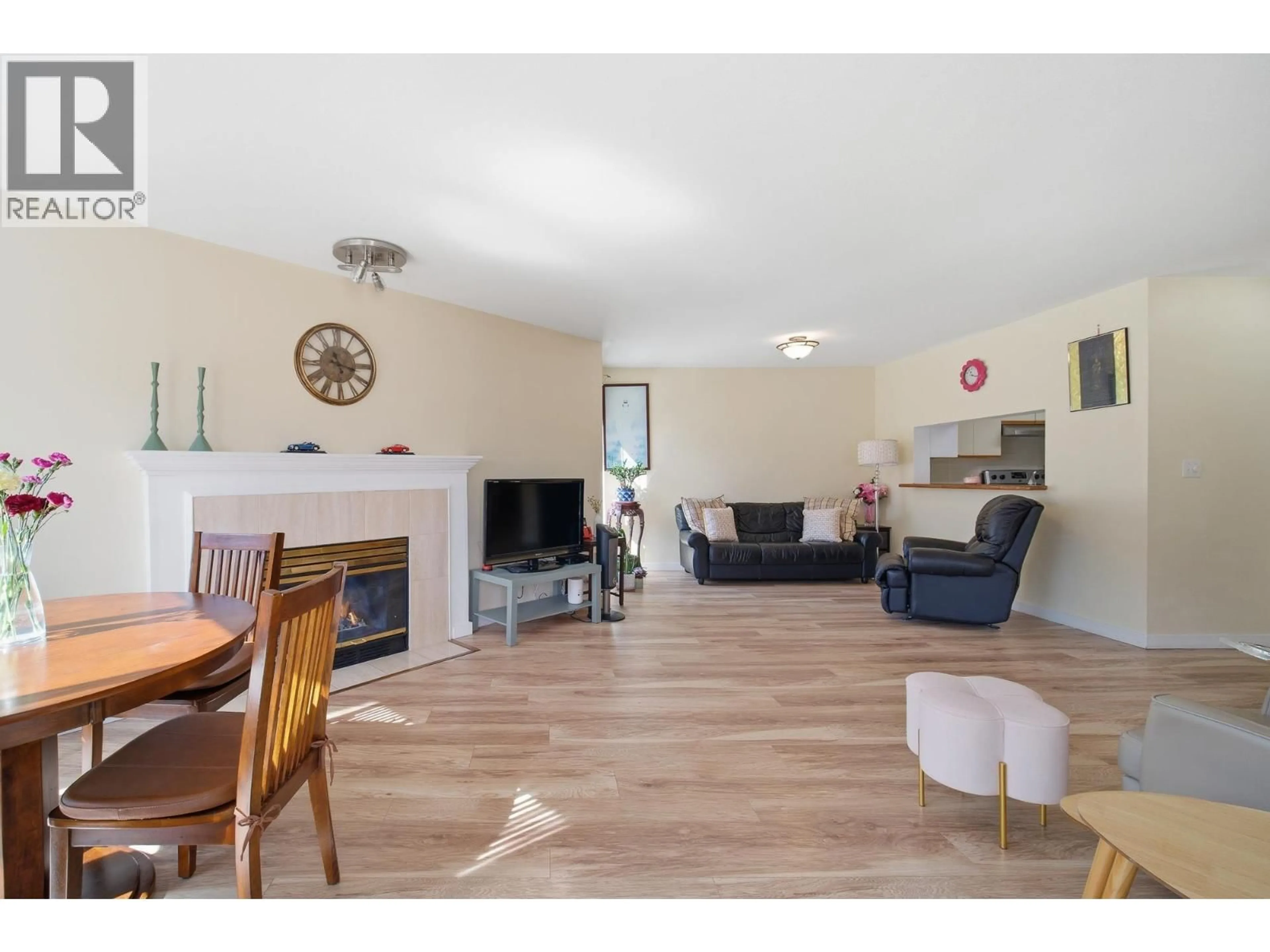 Living room with furniture, wood/laminate floor for 212 - 7437 MOFFATT ROAD, Richmond British Columbia V6Y1X9