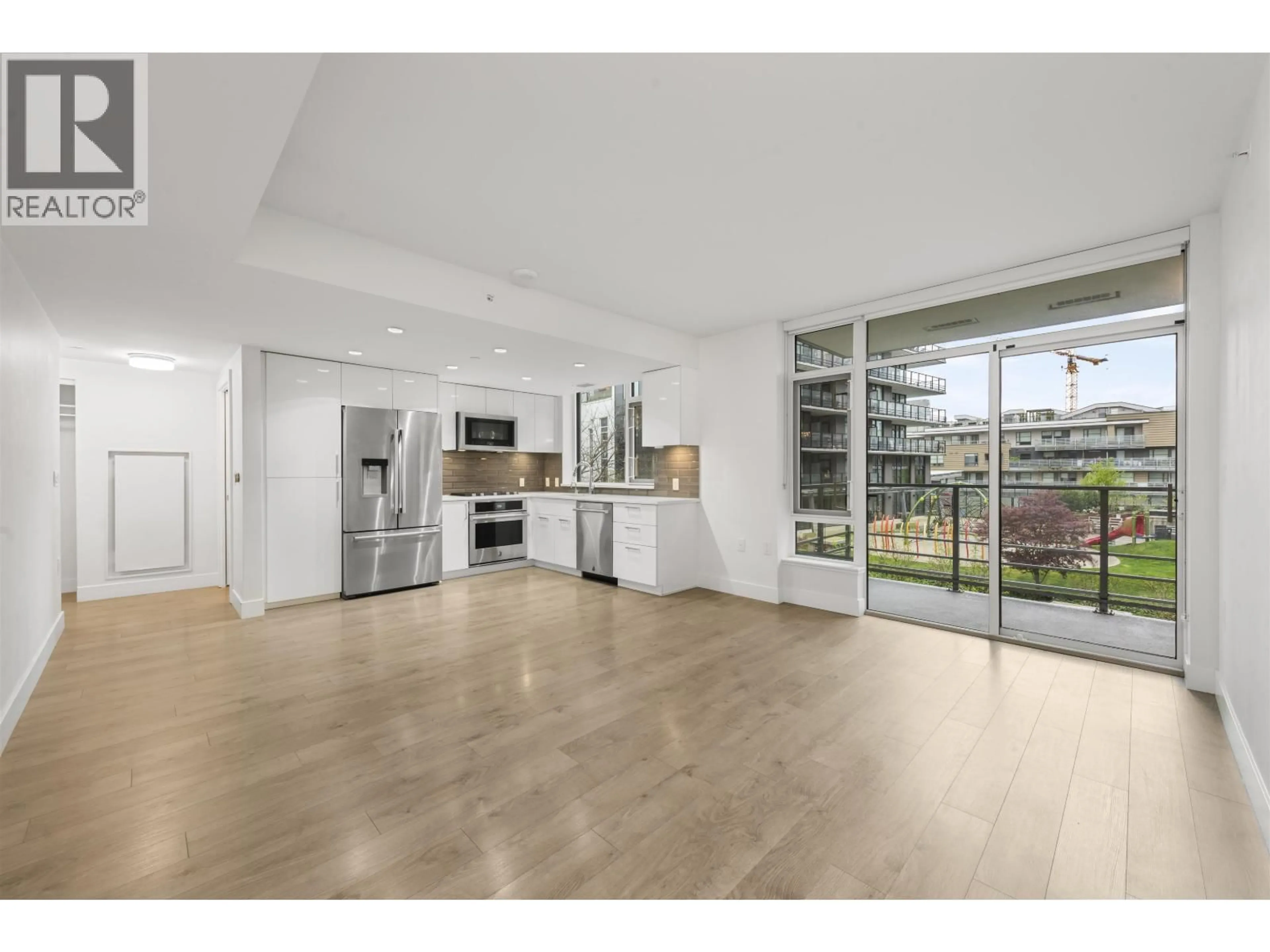 Open concept kitchen, unknown for 304 - 3498 MARINE WAY, Vancouver British Columbia V5S0H1