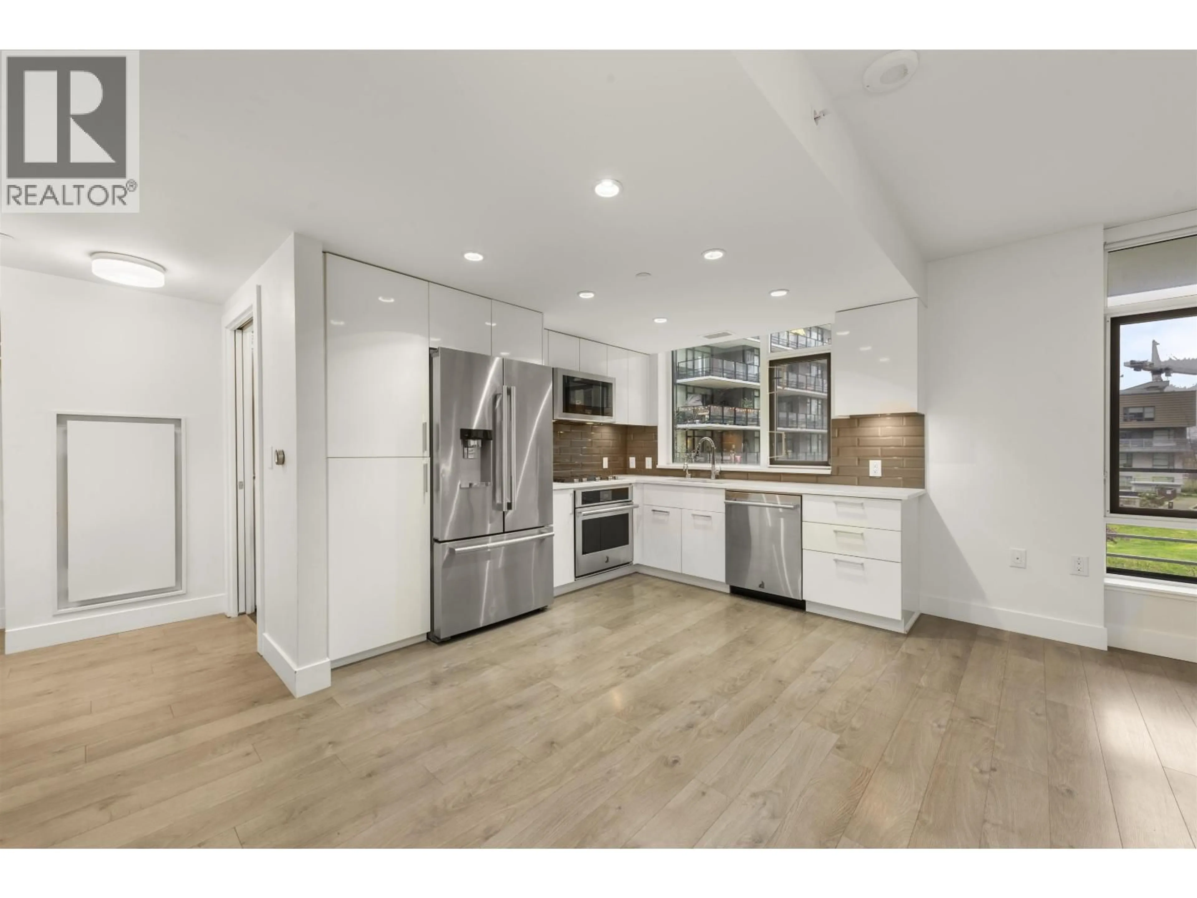 Open concept kitchen, unknown for 304 - 3498 MARINE WAY, Vancouver British Columbia V5S0H1