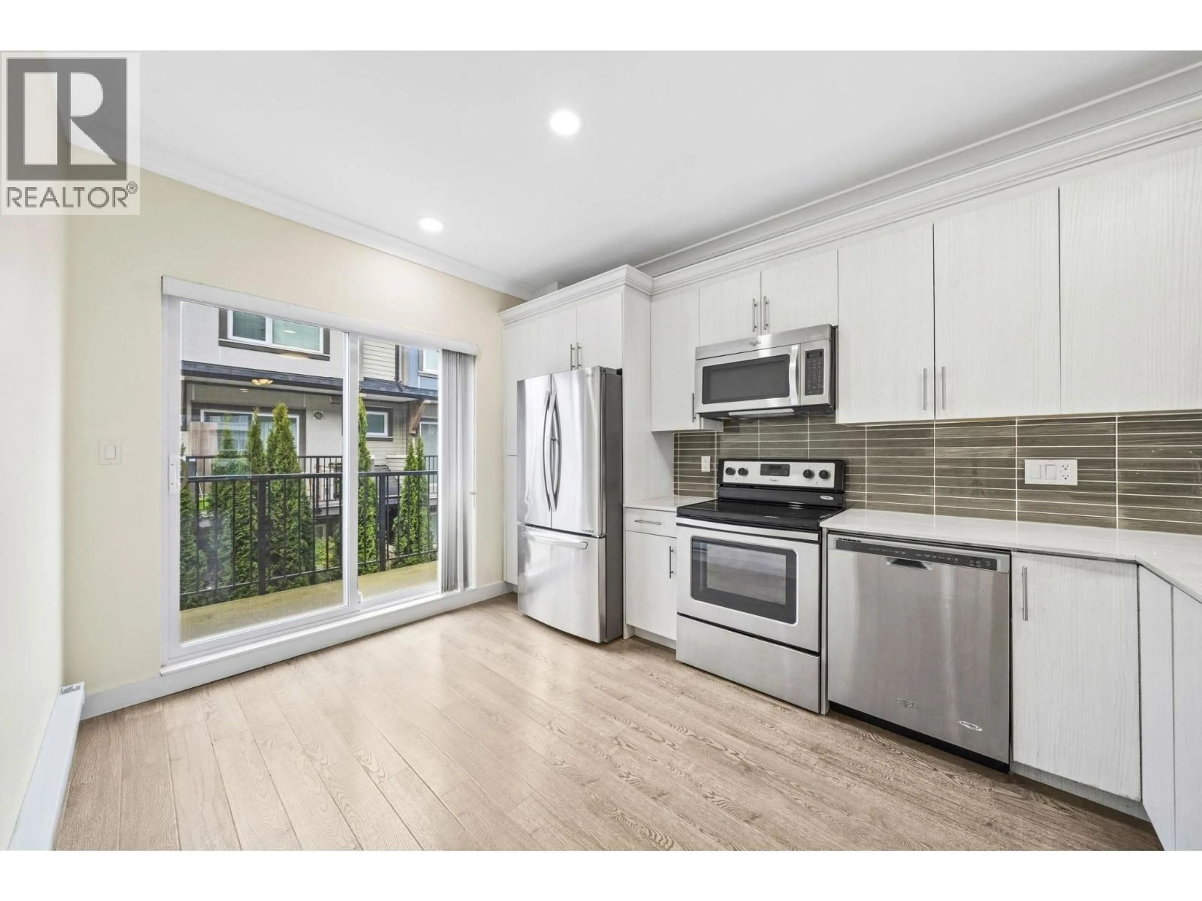Open concept kitchen, unknown for 2 - 4191 NO. 4 ROAD, Richmond British Columbia V6X2M2