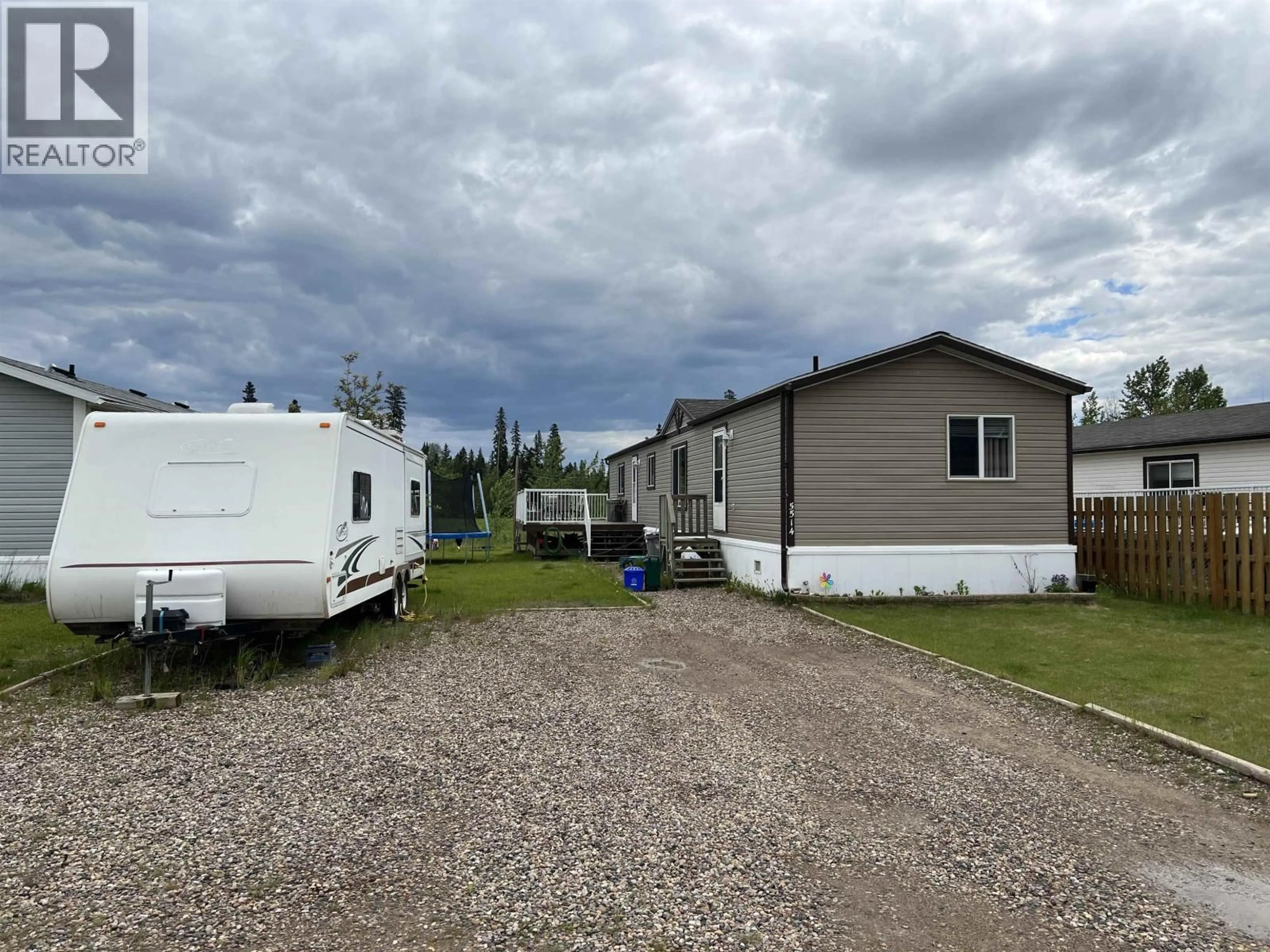 A pic from outside/outdoor area/front of a property/back of a property/a pic from drone, unknown for 5514 PINE CRESCENT, Fort Nelson British Columbia V0C1R0