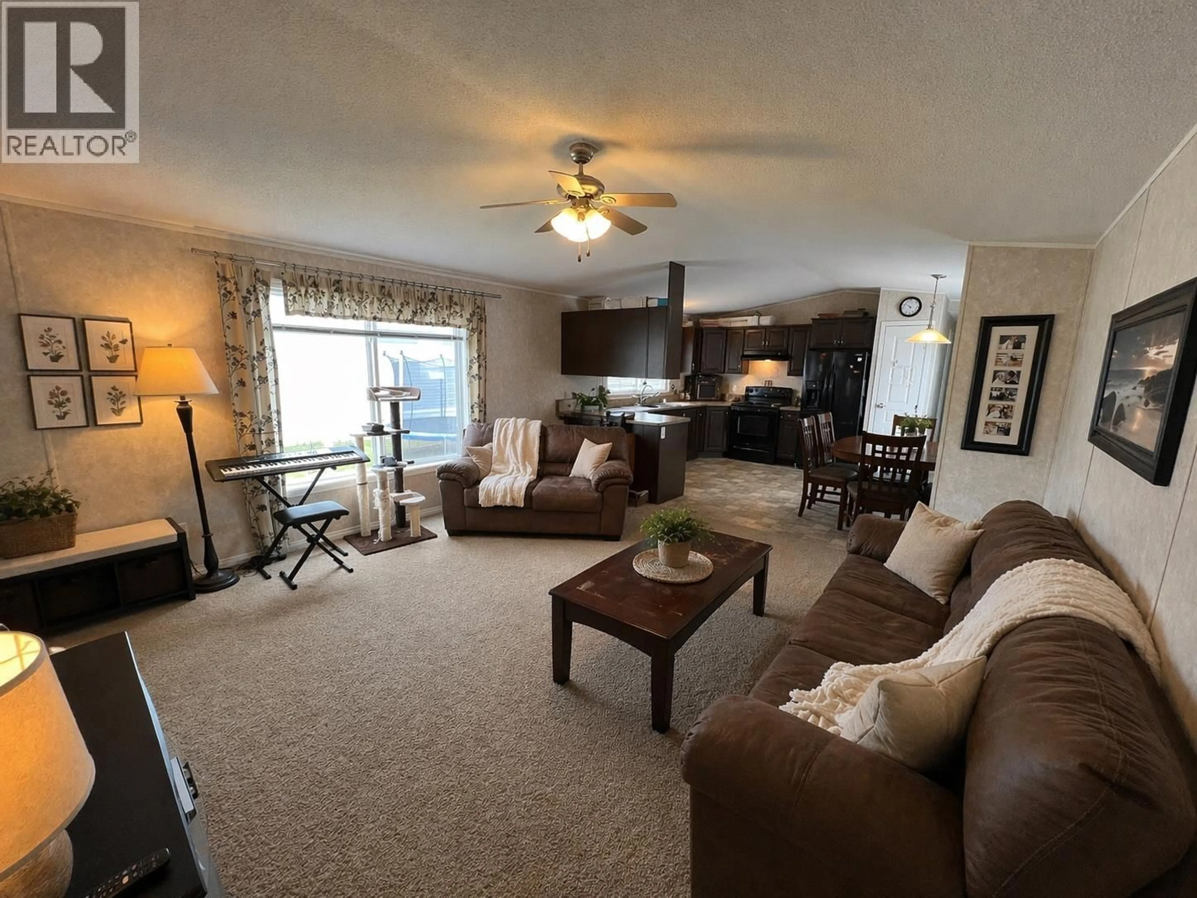 Living room with furniture, unknown for 5514 PINE CRESCENT, Fort Nelson British Columbia V0C1R0