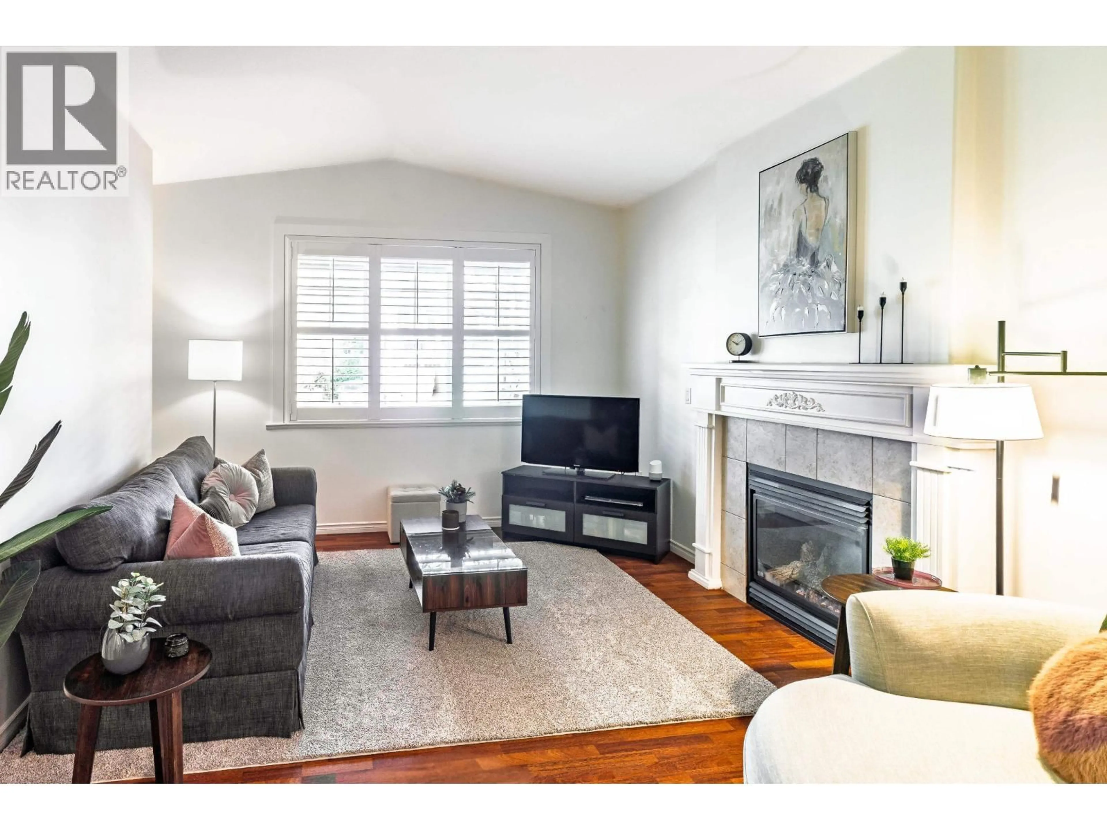 Living room with furniture, wood/laminate floor for 23346 133 AVENUE, Maple Ridge British Columbia V4R2W6